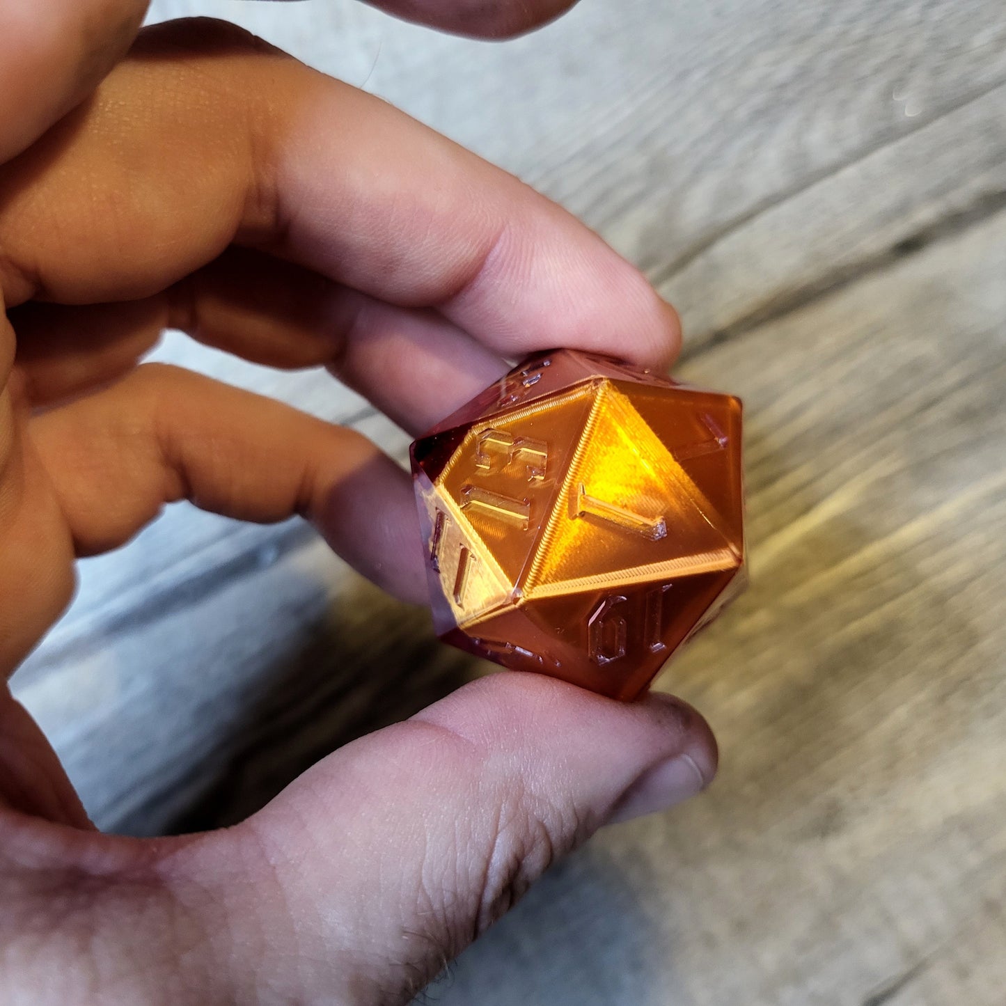 D20 dice in 33 mm format with skull inside for role-playing games for Dungeons and Dragons