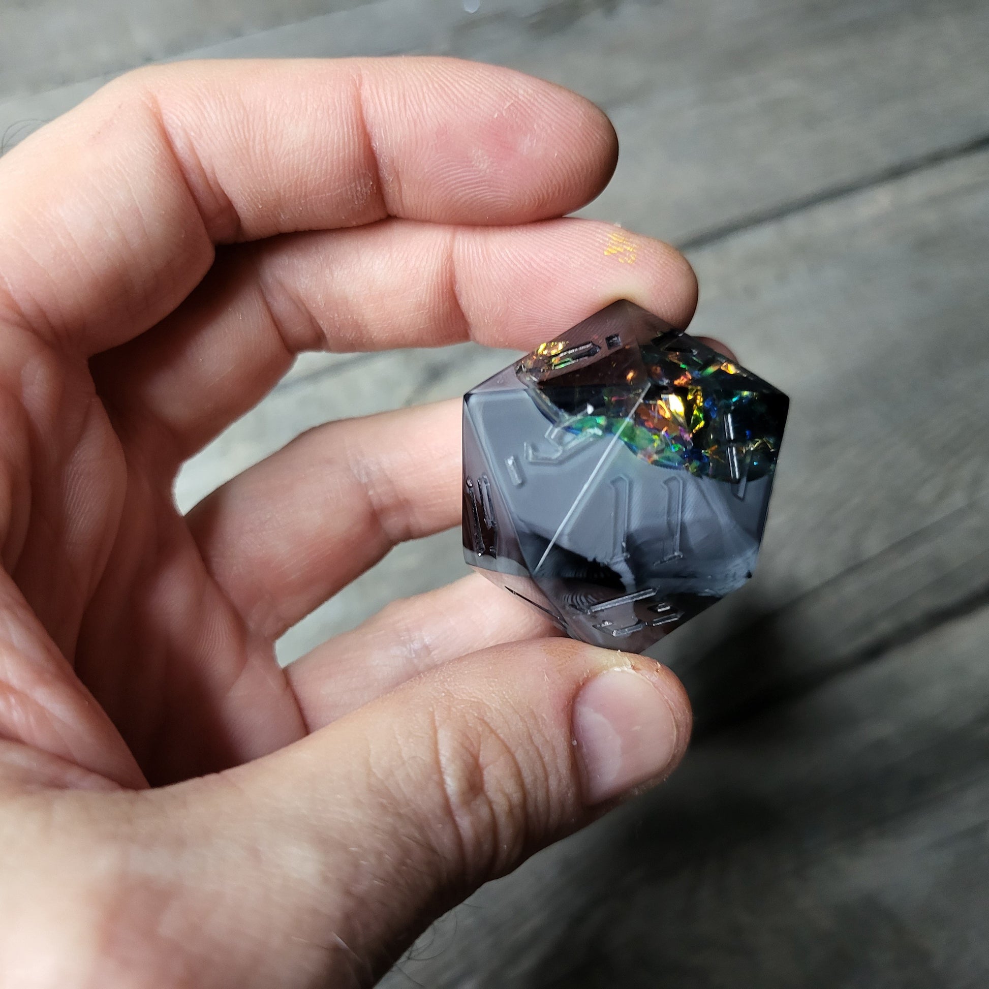 D20 dice in 33 mm format with skull inside for role-playing games for Dungeons and Dragons