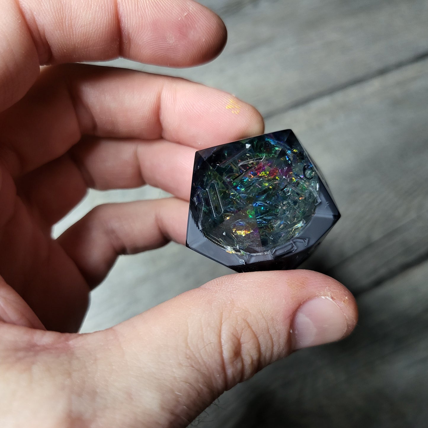 D20 dice in 33 mm format with skull inside for role-playing games for Dungeons and Dragons