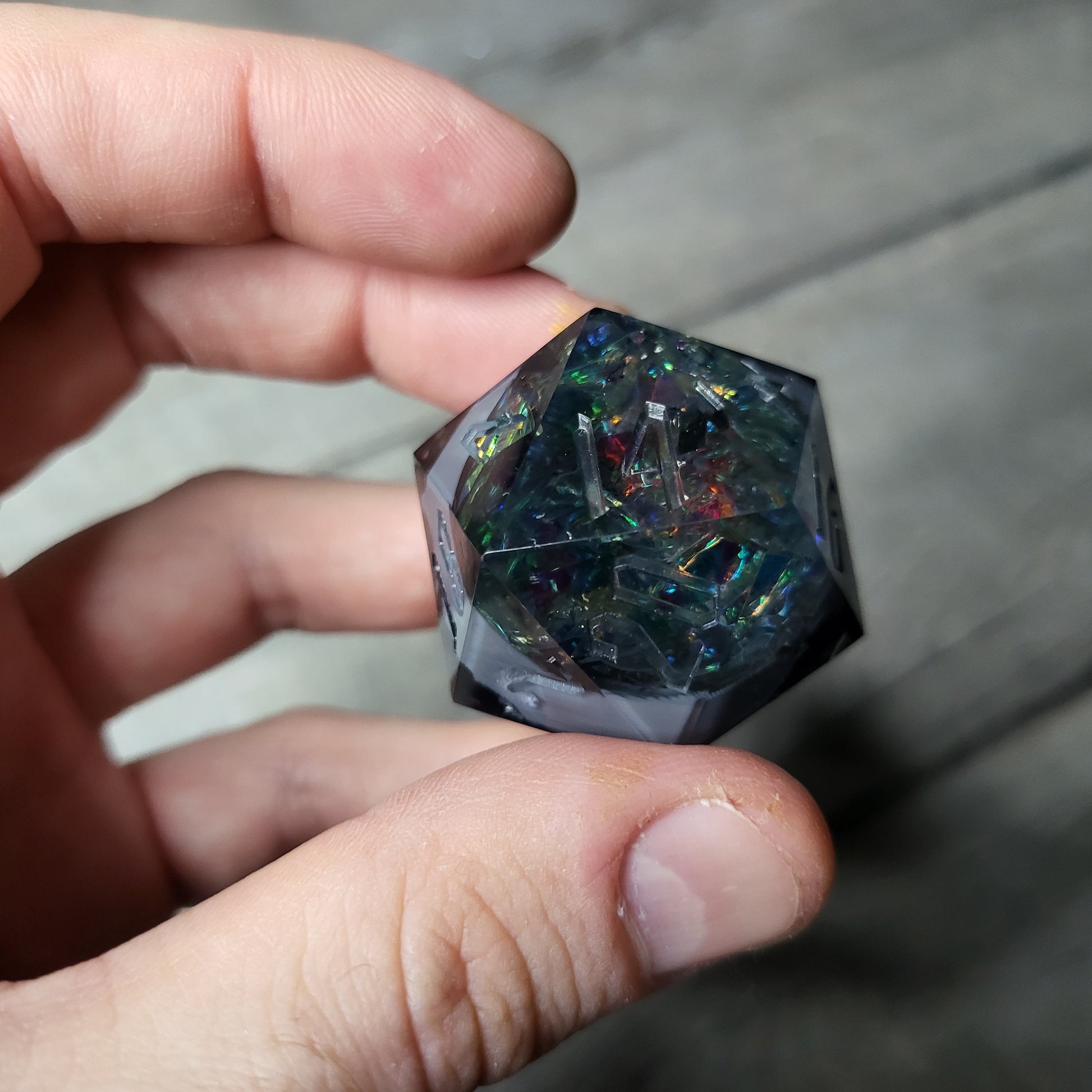 D20 dice in 33 mm format with skull inside for role-playing games for Dungeons and Dragons