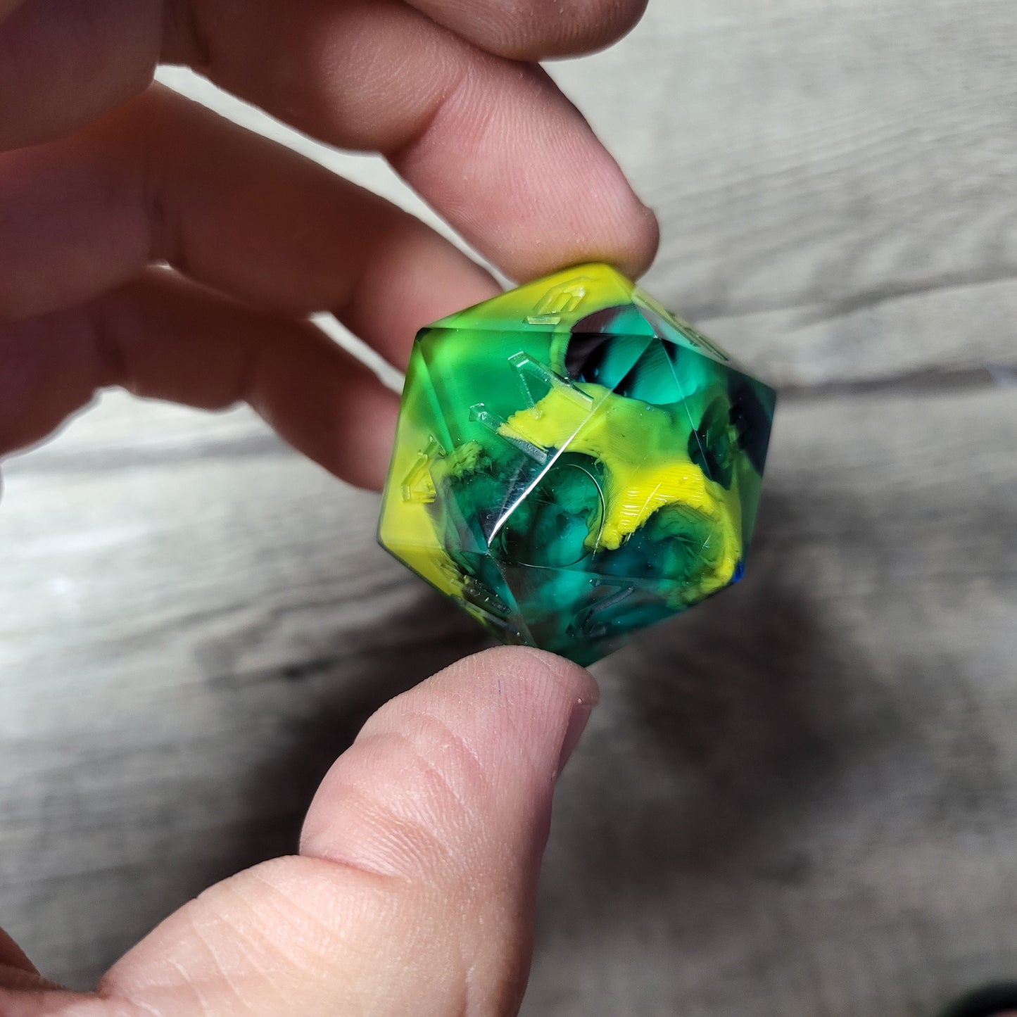 D20 dice in 33 mm format with skull inside for role-playing games for Dungeons and Dragons