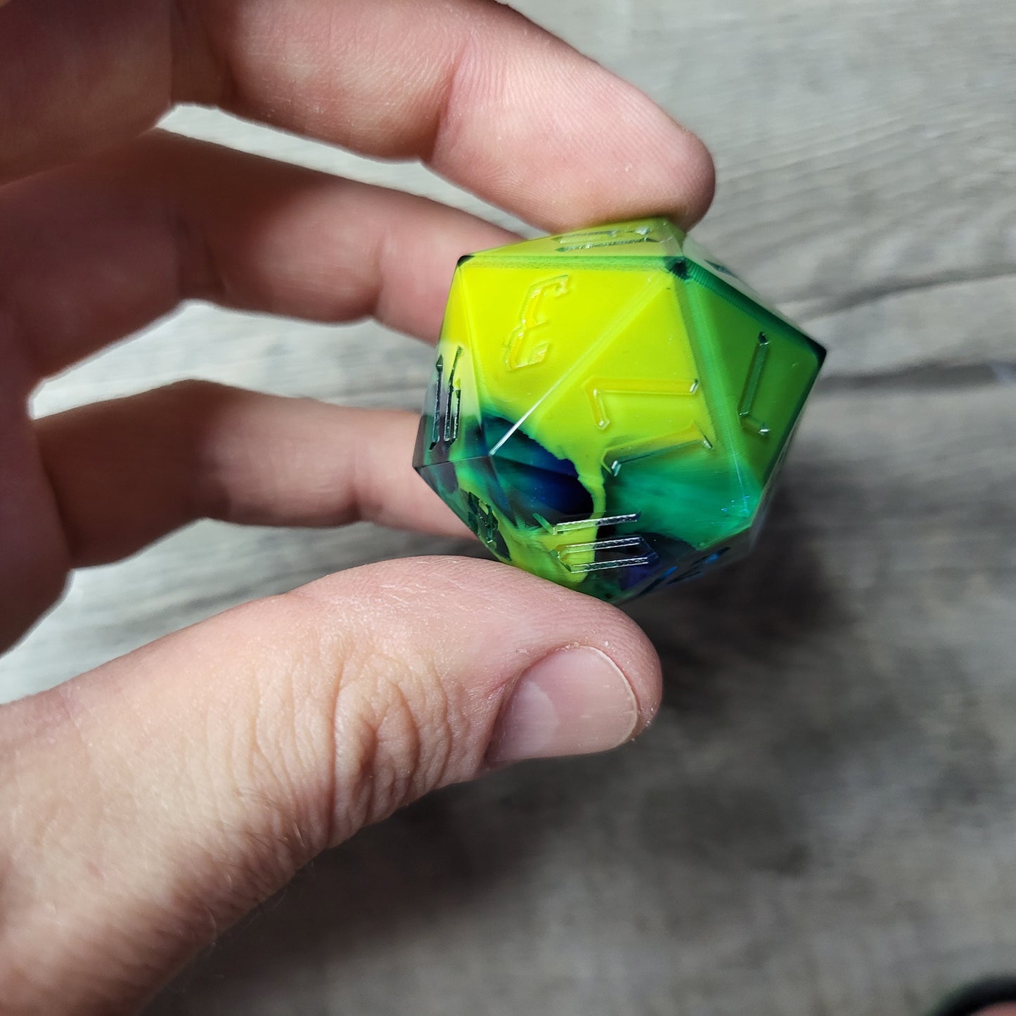 D20 dice in 33 mm format with skull inside for role-playing games for Dungeons and Dragons