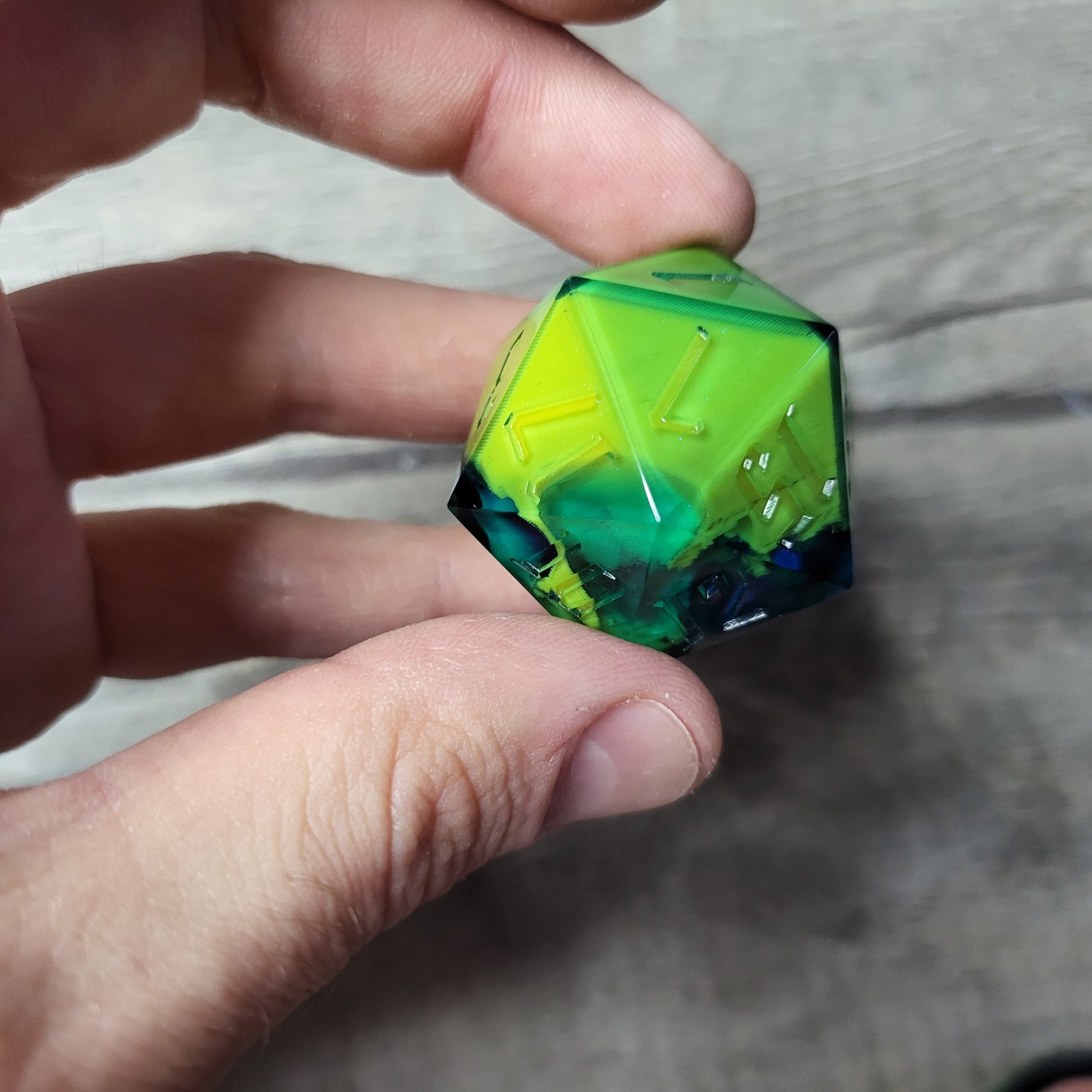 D20 dice in 33 mm format with skull inside for role-playing games for Dungeons and Dragons