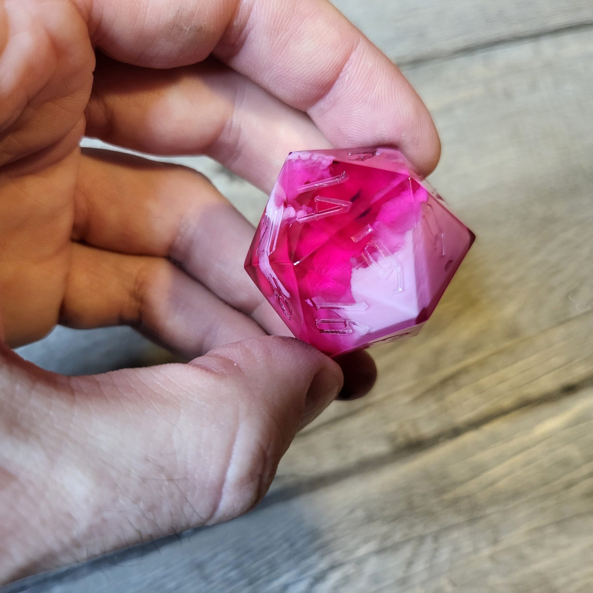 D20 dice in 33 mm format with skull inside for role-playing games for Dungeons and Dragons