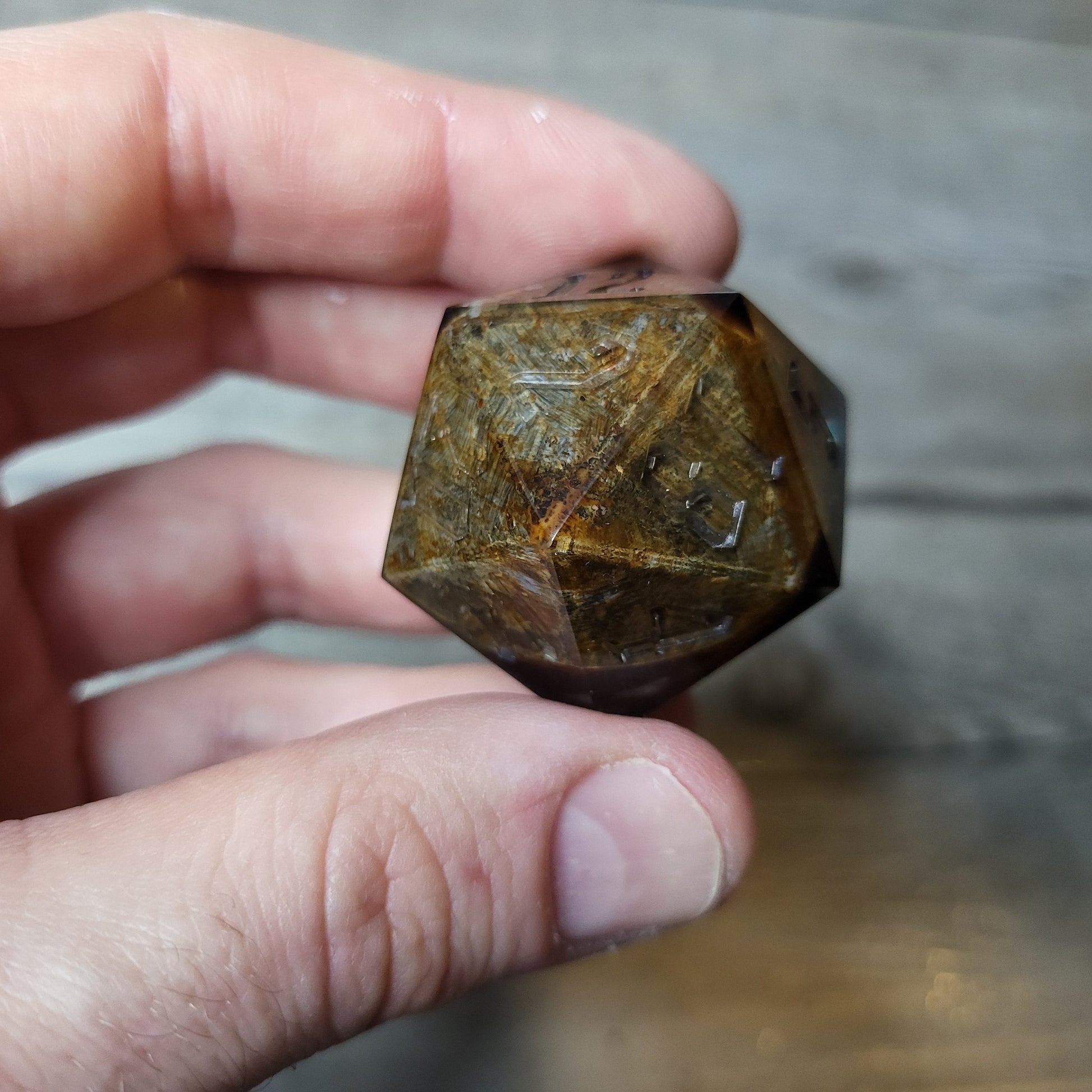 D20 dice in 33 mm format with skull inside for role-playing games for Dungeons and Dragons