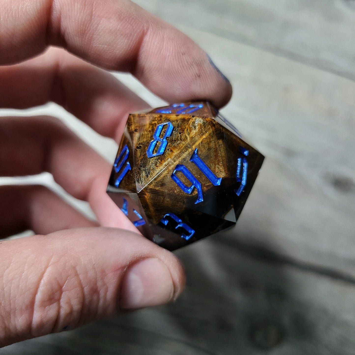 D20 dice in 33 mm format with skull inside for role-playing games for Dungeons and Dragons