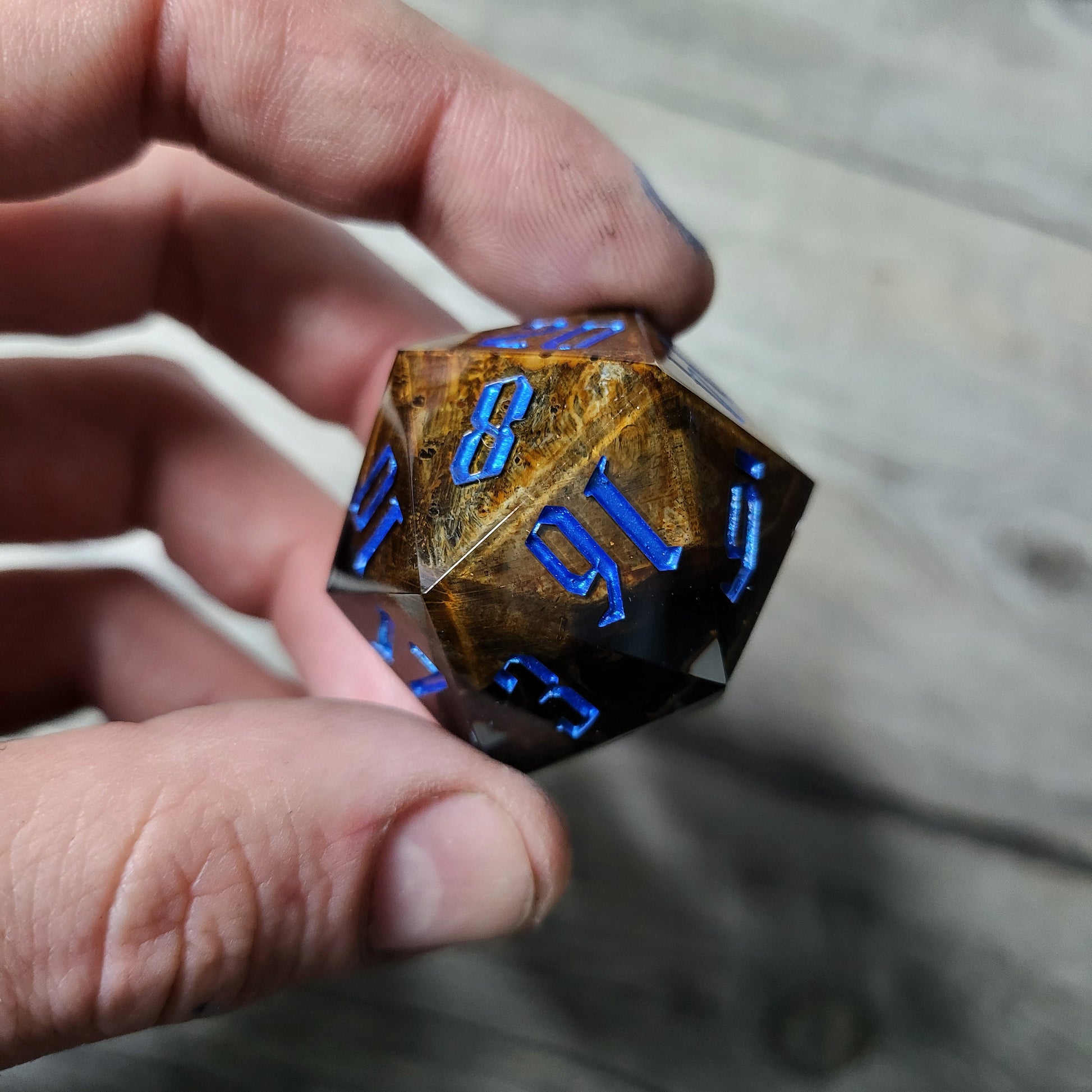 D20 dice in 33 mm format with skull inside for role-playing games for Dungeons and Dragons