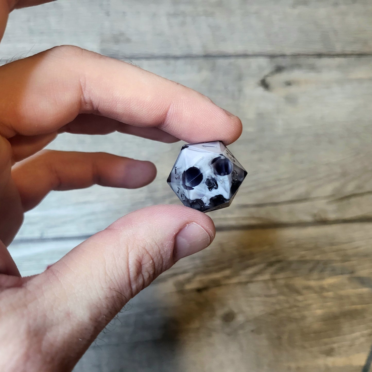 Dice D20 with skull inside for role playing for Dungeons and Dragons