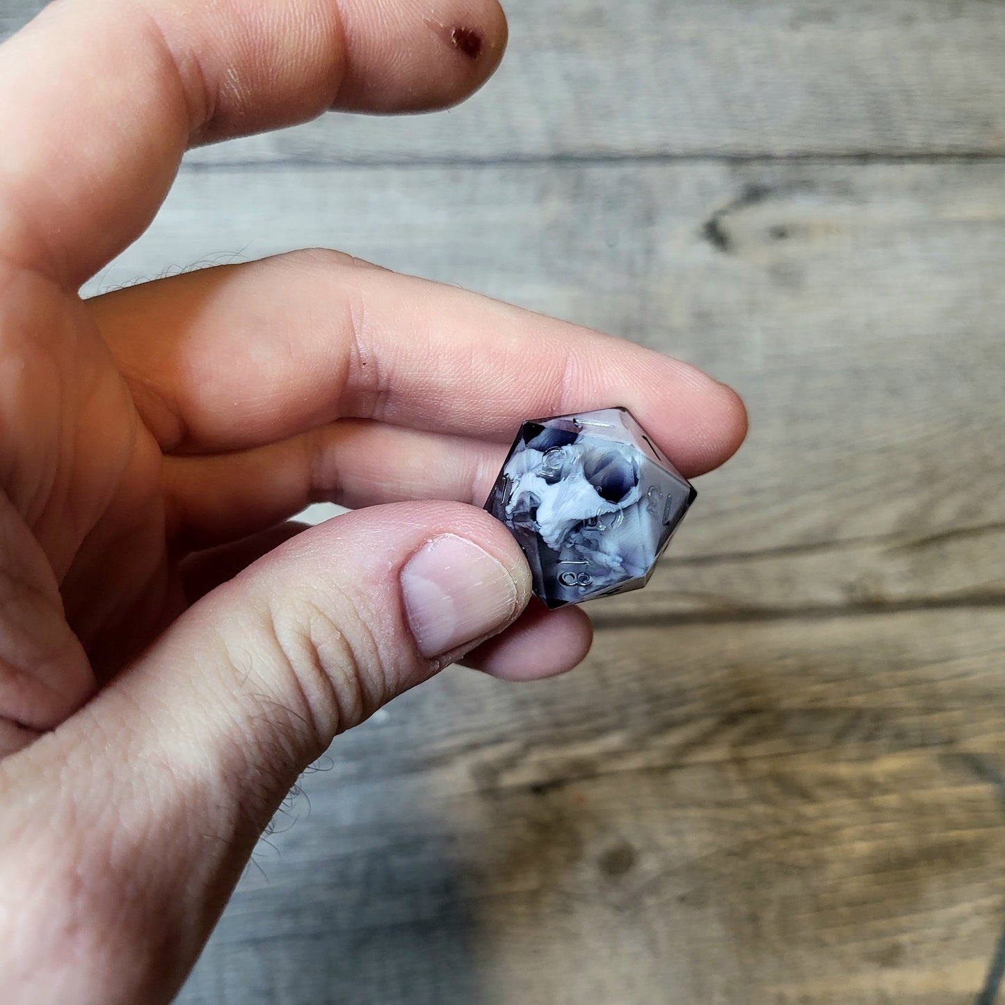 Dice D20 with skull inside for role playing for Dungeons and Dragons