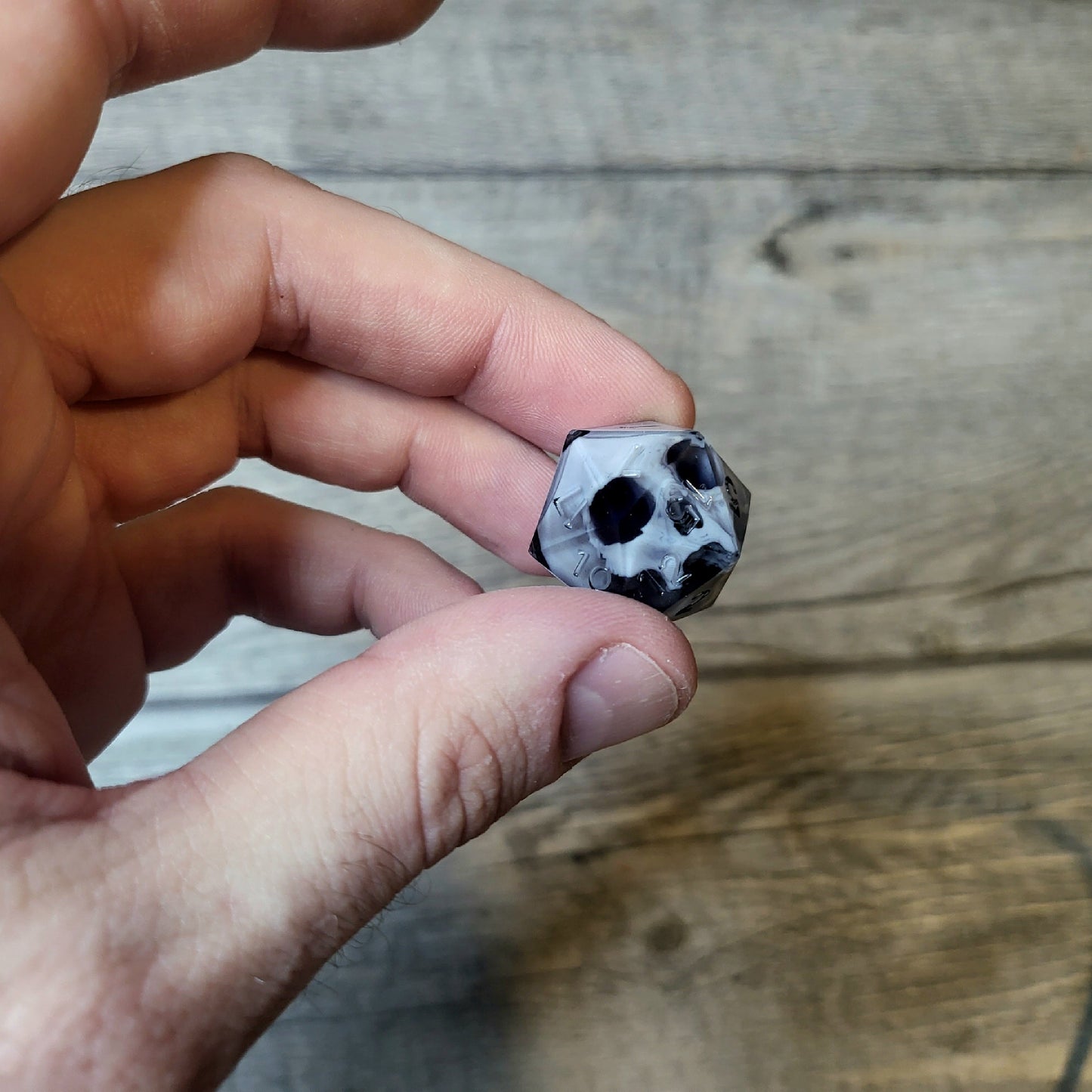 Dice D20 with skull inside for role playing for Dungeons and Dragons