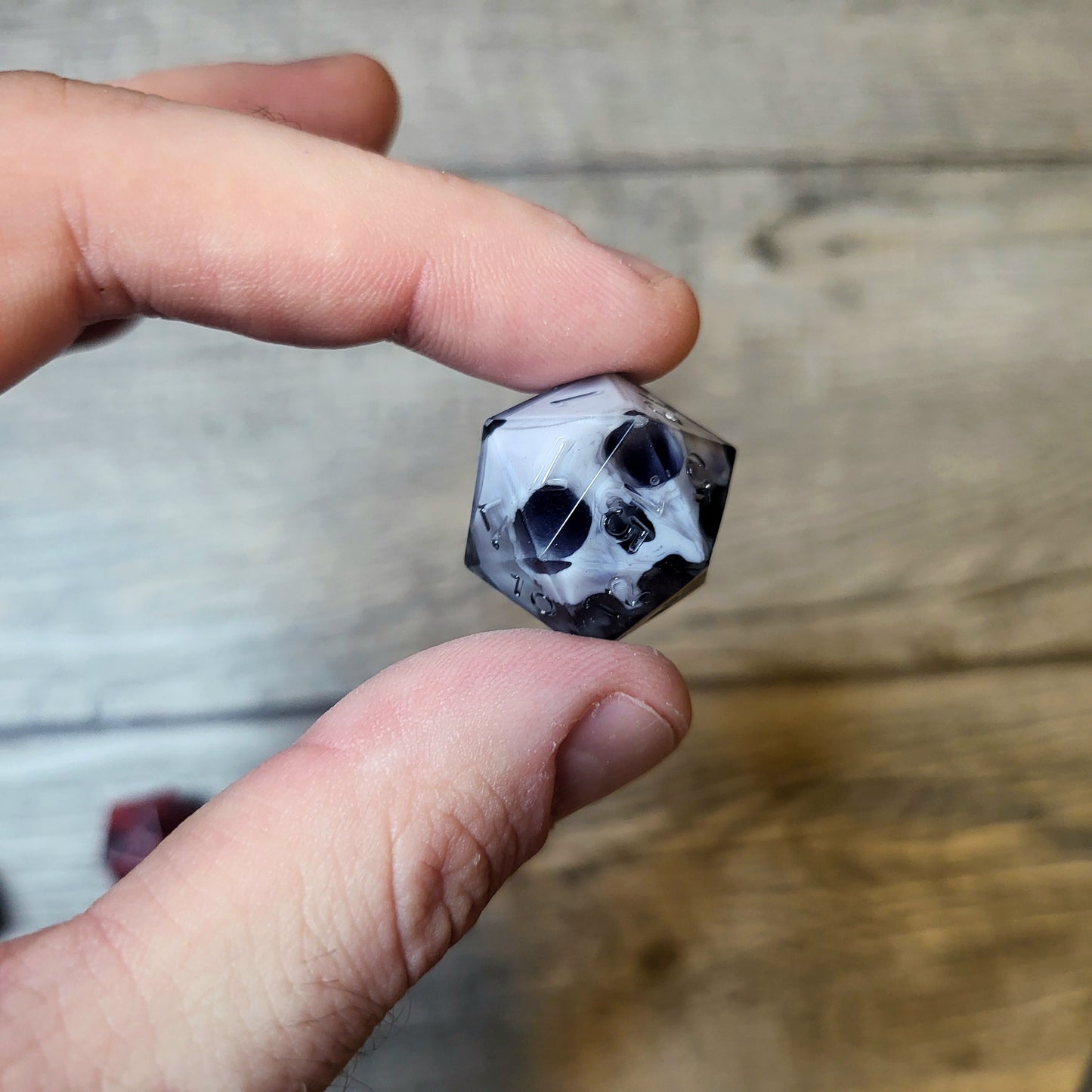 Dice D20 with skull inside for role playing for Dungeons and Dragons