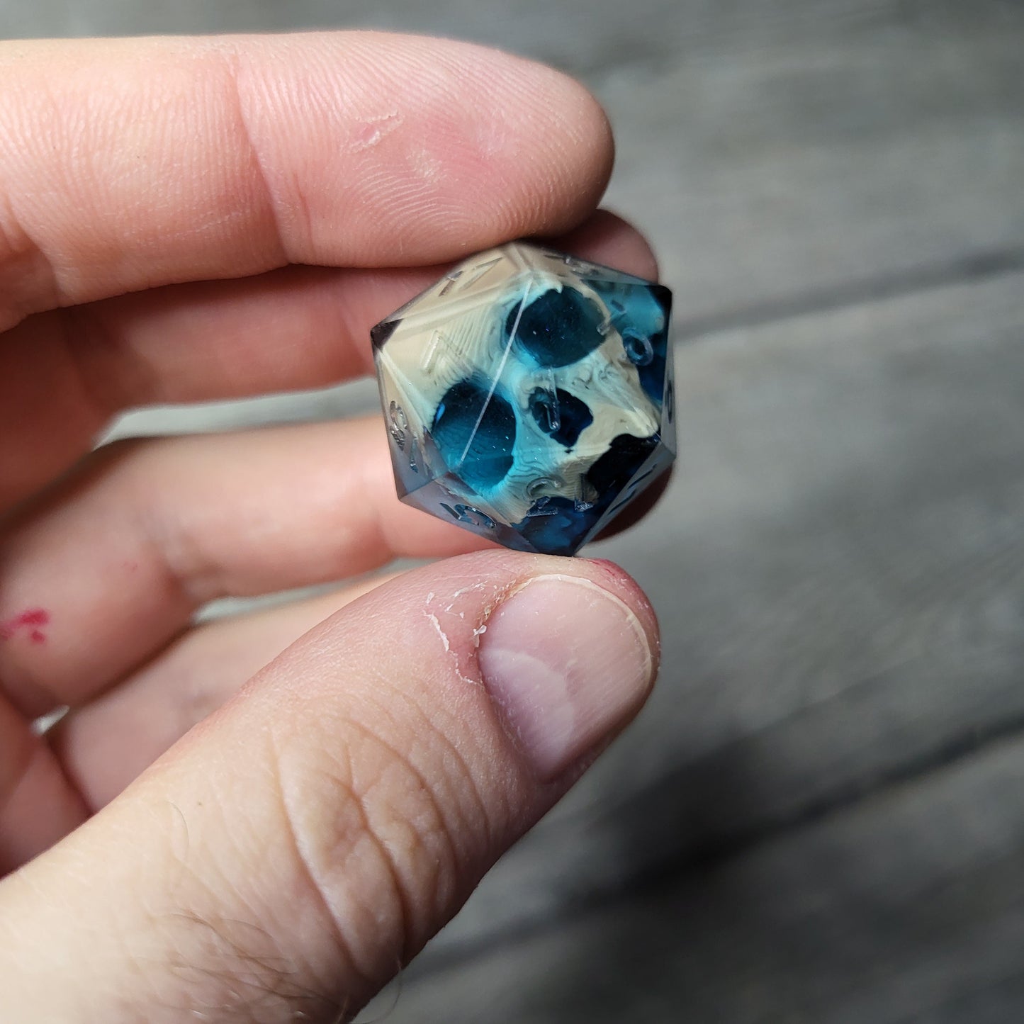 Dice D20 with skull inside for role playing for Dungeons and Dragons