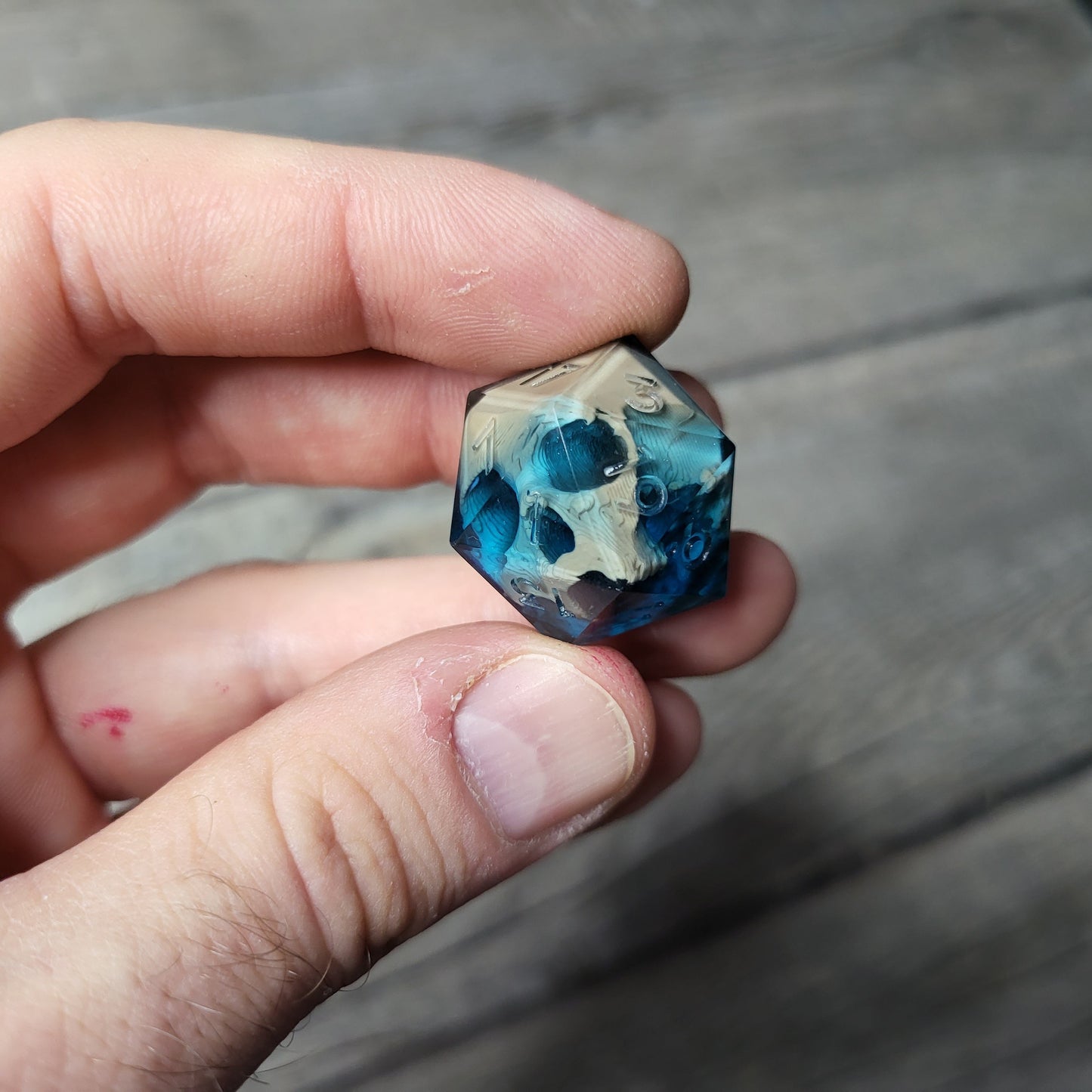 Dice D20 with skull inside for role playing for Dungeons and Dragons