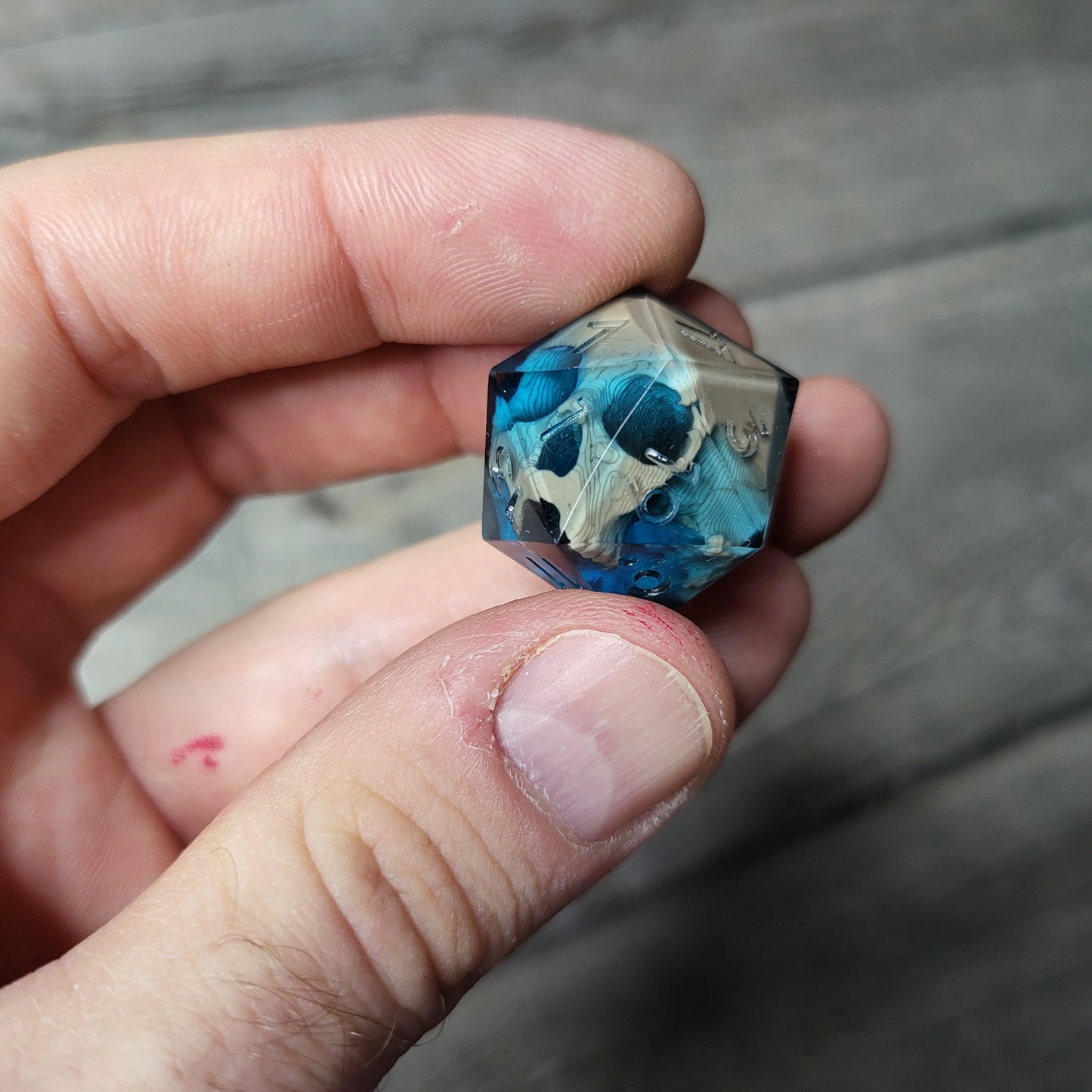 Dice D20 with skull inside for role playing for Dungeons and Dragons