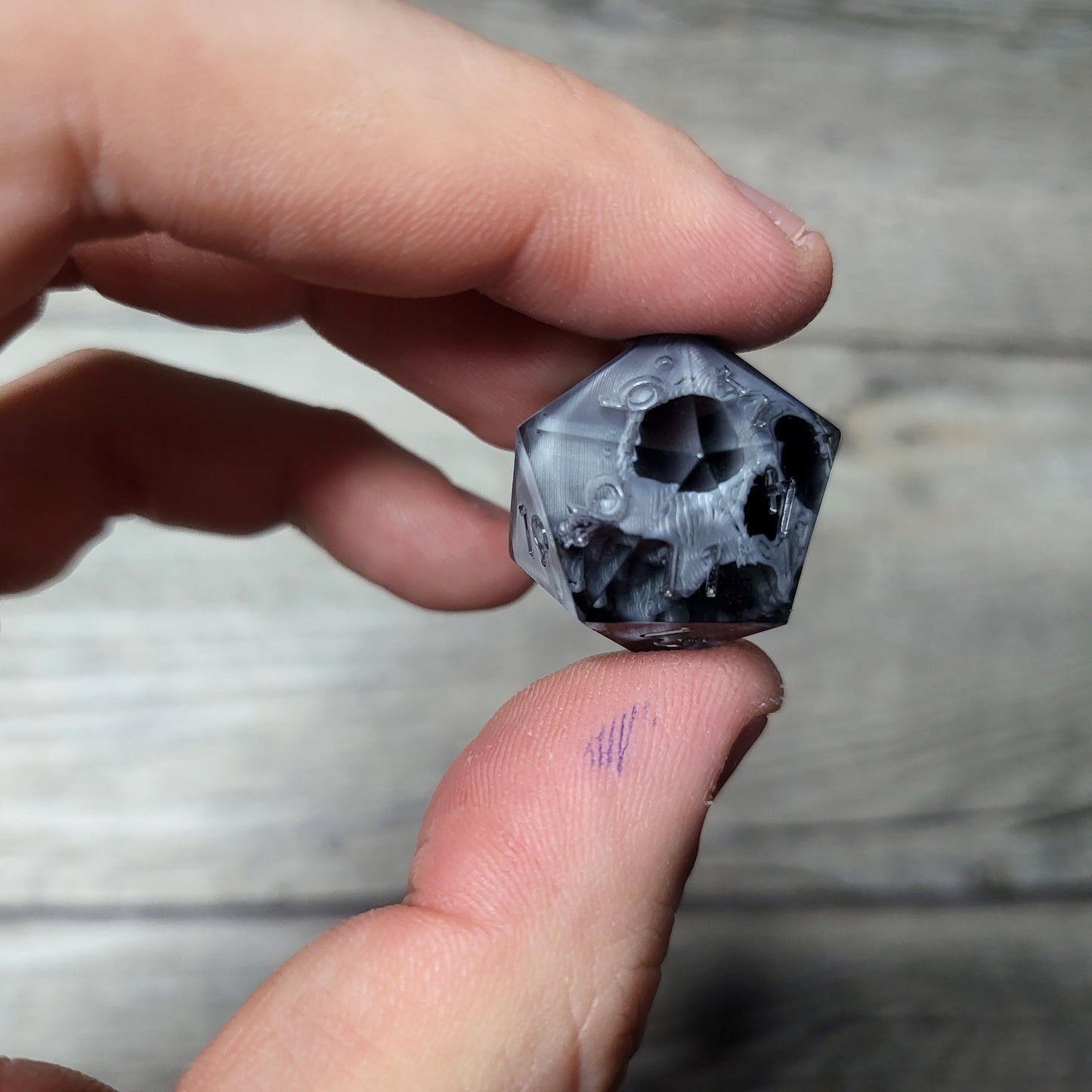 Dice D20 with skull inside for role playing for Dungeons and Dragons