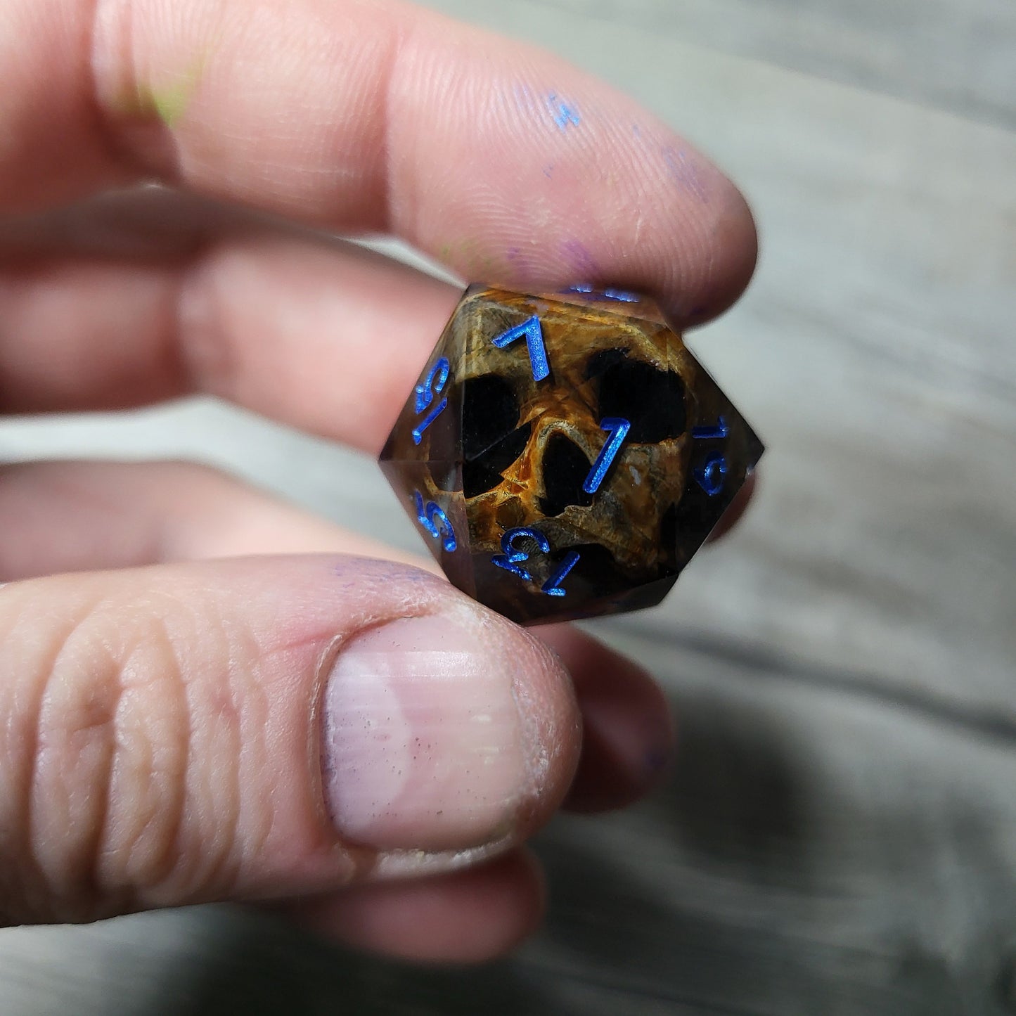 Dice D20 with skull inside for role playing for Dungeons and Dragons