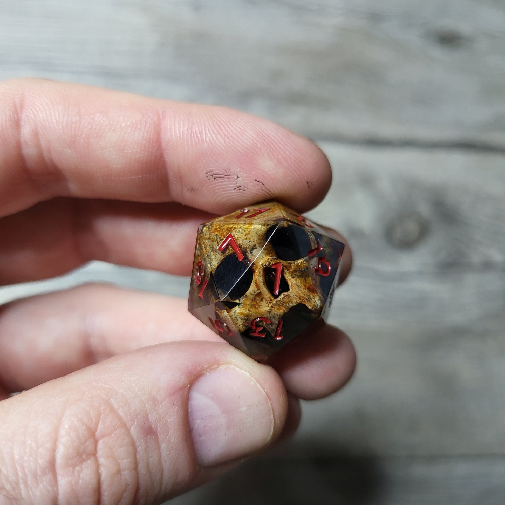 Dice D20 with skull inside for role playing for Dungeons and Dragons