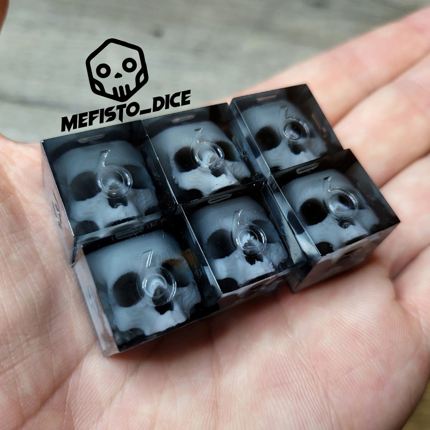 Dice set in D6 format with skull inside for role-playing games for Dungeons and Dragons