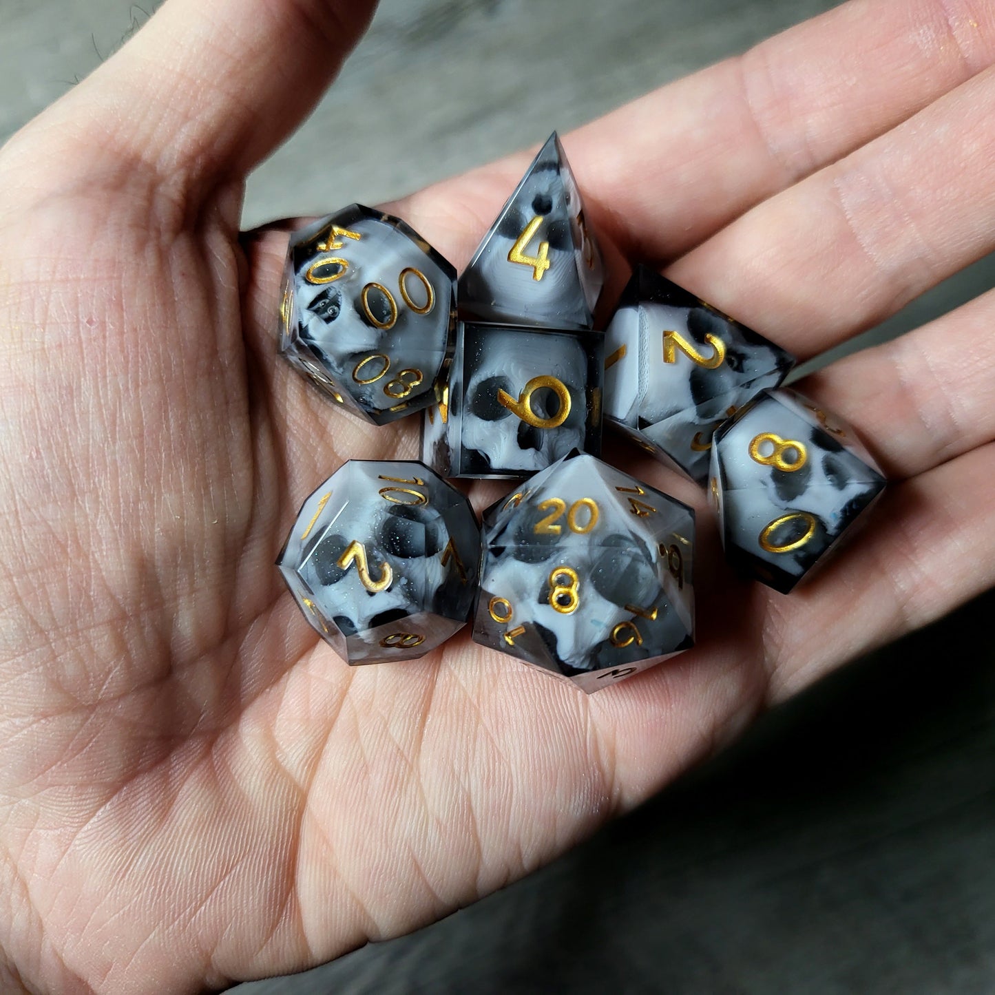Dice set with 7 pieces with skull inside for role-playing games for Dungeons and Dragons
