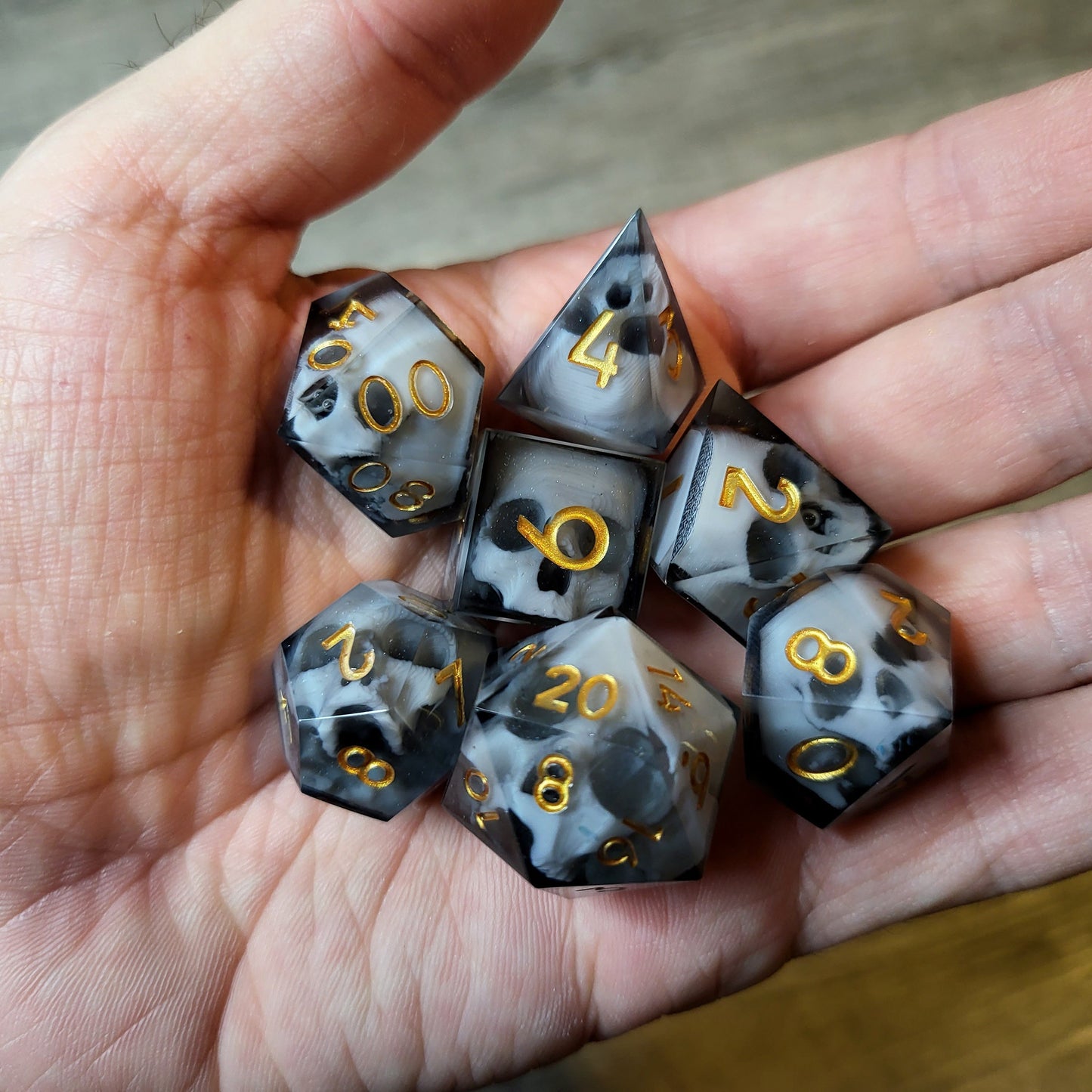 Dice set with 7 pieces with skull inside for role-playing games for Dungeons and Dragons