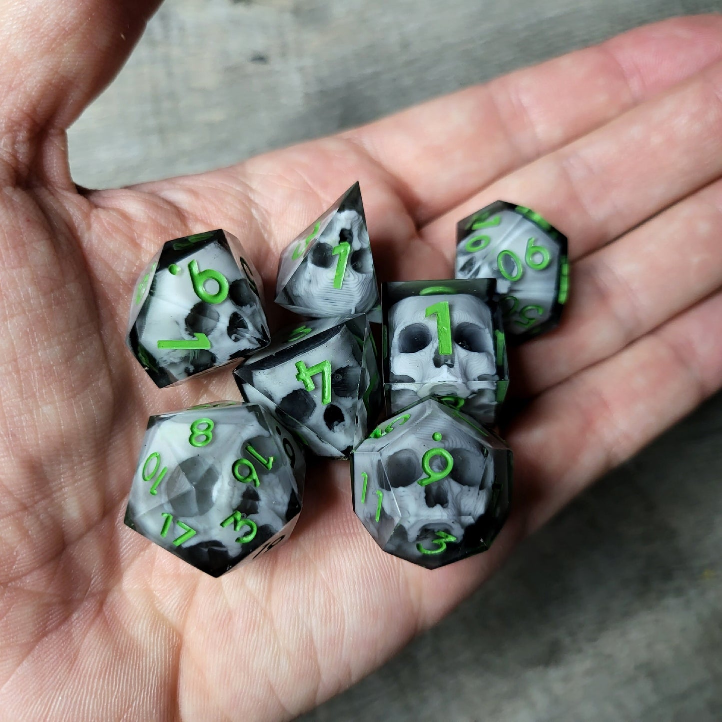 Dice set with 7 pieces with skull inside for role-playing games for Dungeons and Dragons