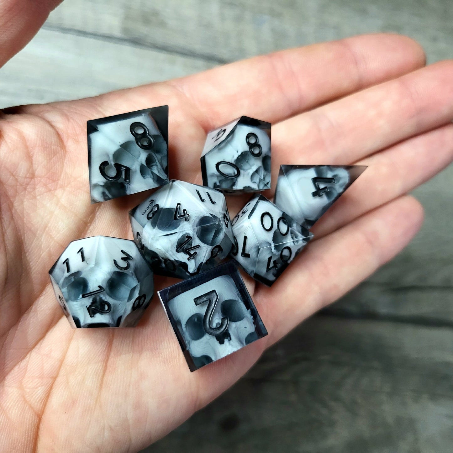 Dice set with 7 pieces with skull inside for role-playing games for Dungeons and Dragons