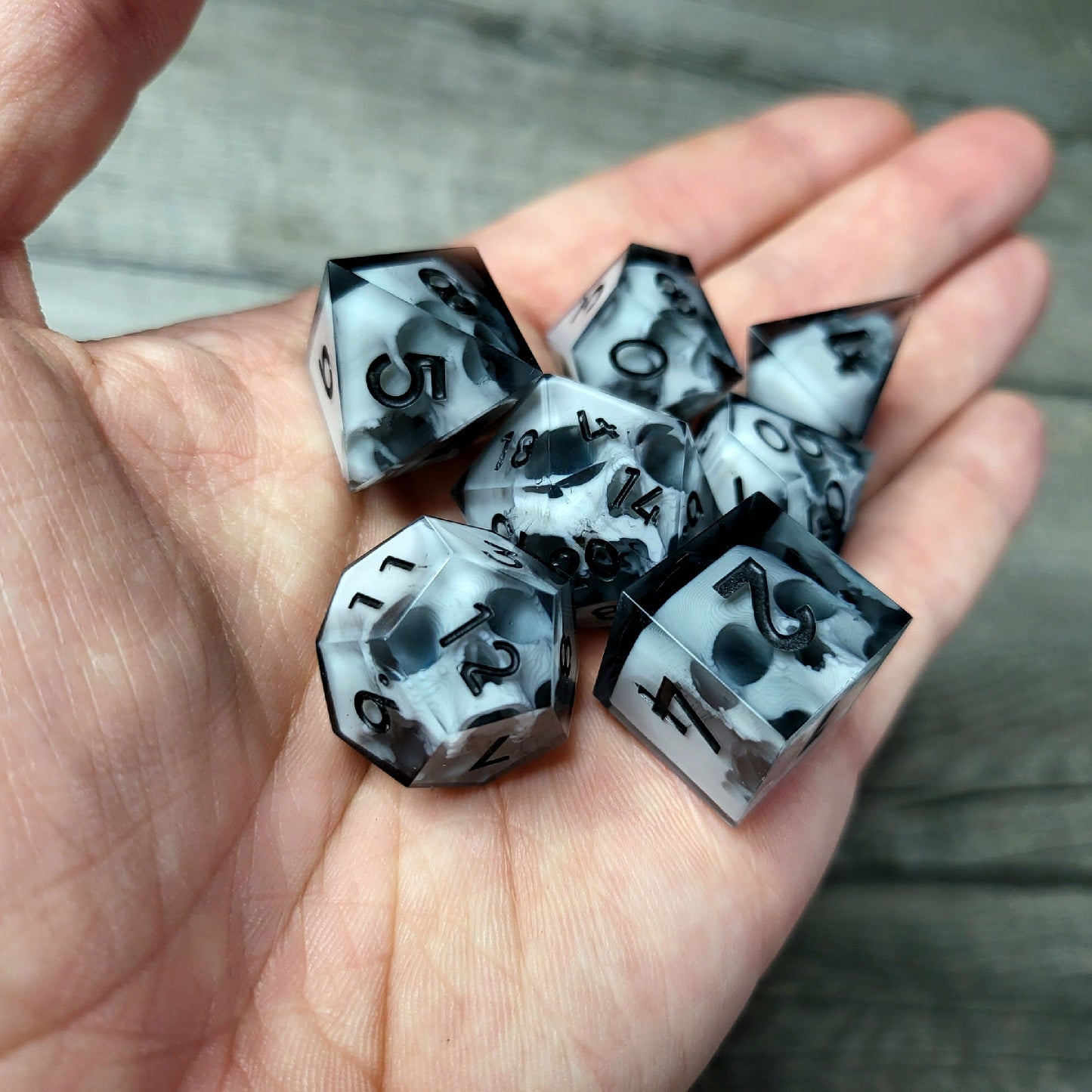 Dice set with 7 pieces with skull inside for role-playing games for Dungeons and Dragons
