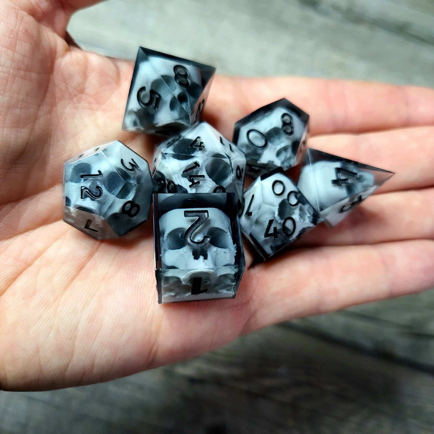 Dice set with 7 pieces with skull inside for role-playing games for Dungeons and Dragons