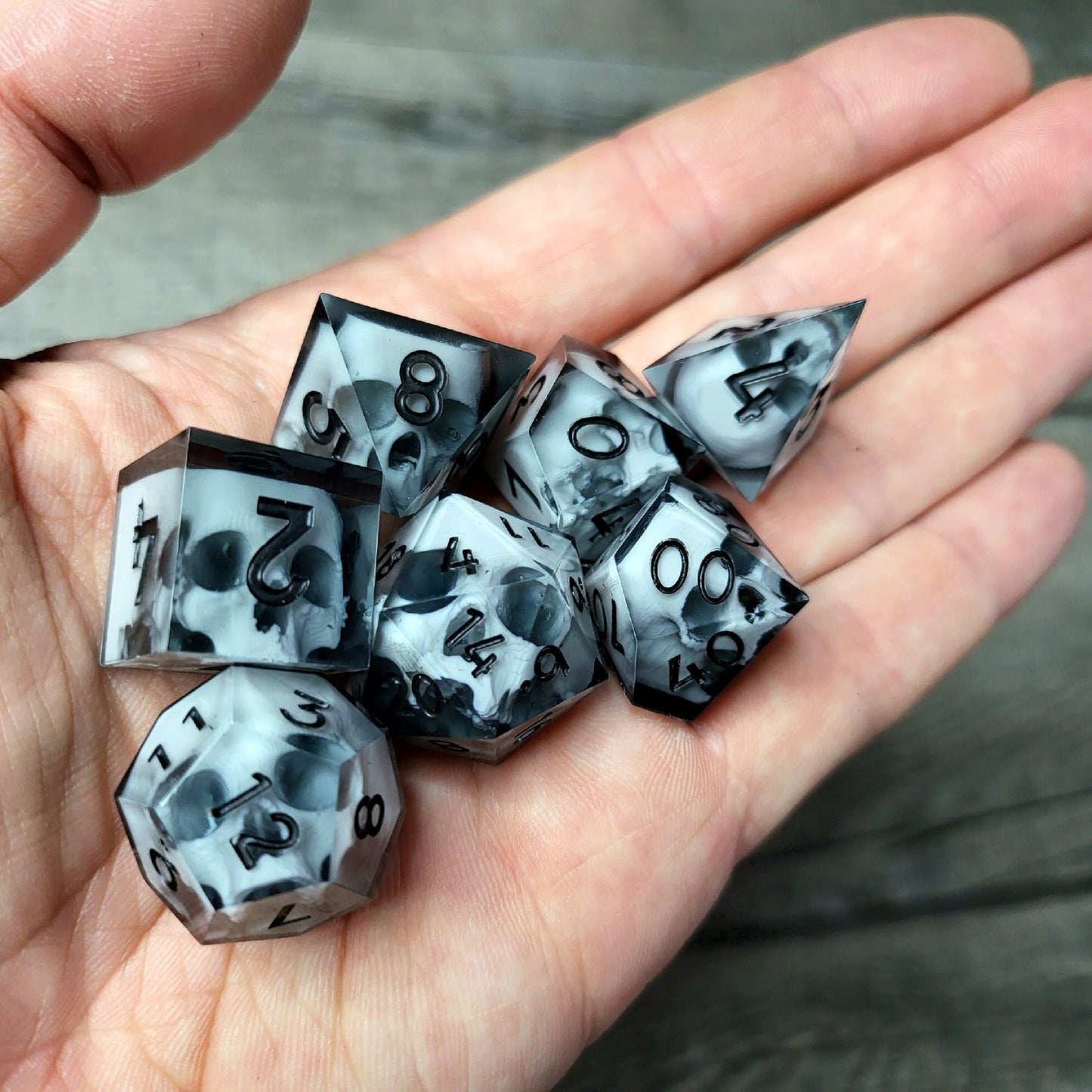Dice set with 7 pieces with skull inside for role-playing games for Dungeons and Dragons