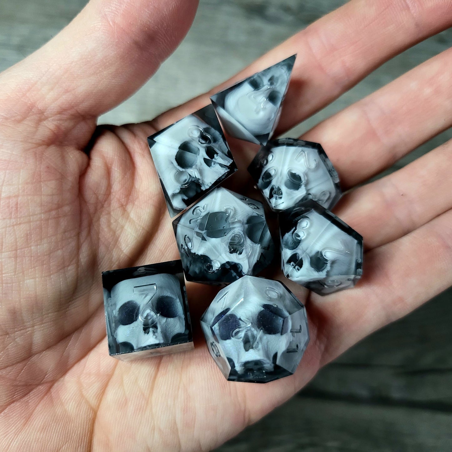 Dice set with 7 pieces with skull inside for role-playing games for Dungeons and Dragons