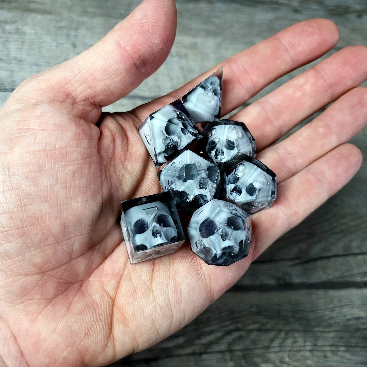 Dice set with 7 pieces with skull inside for role-playing games for Dungeons and Dragons
