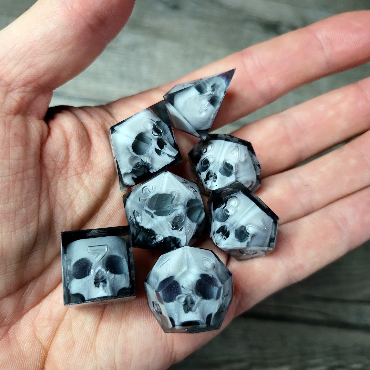 Dice set with 7 pieces with skull inside for role-playing games for Dungeons and Dragons