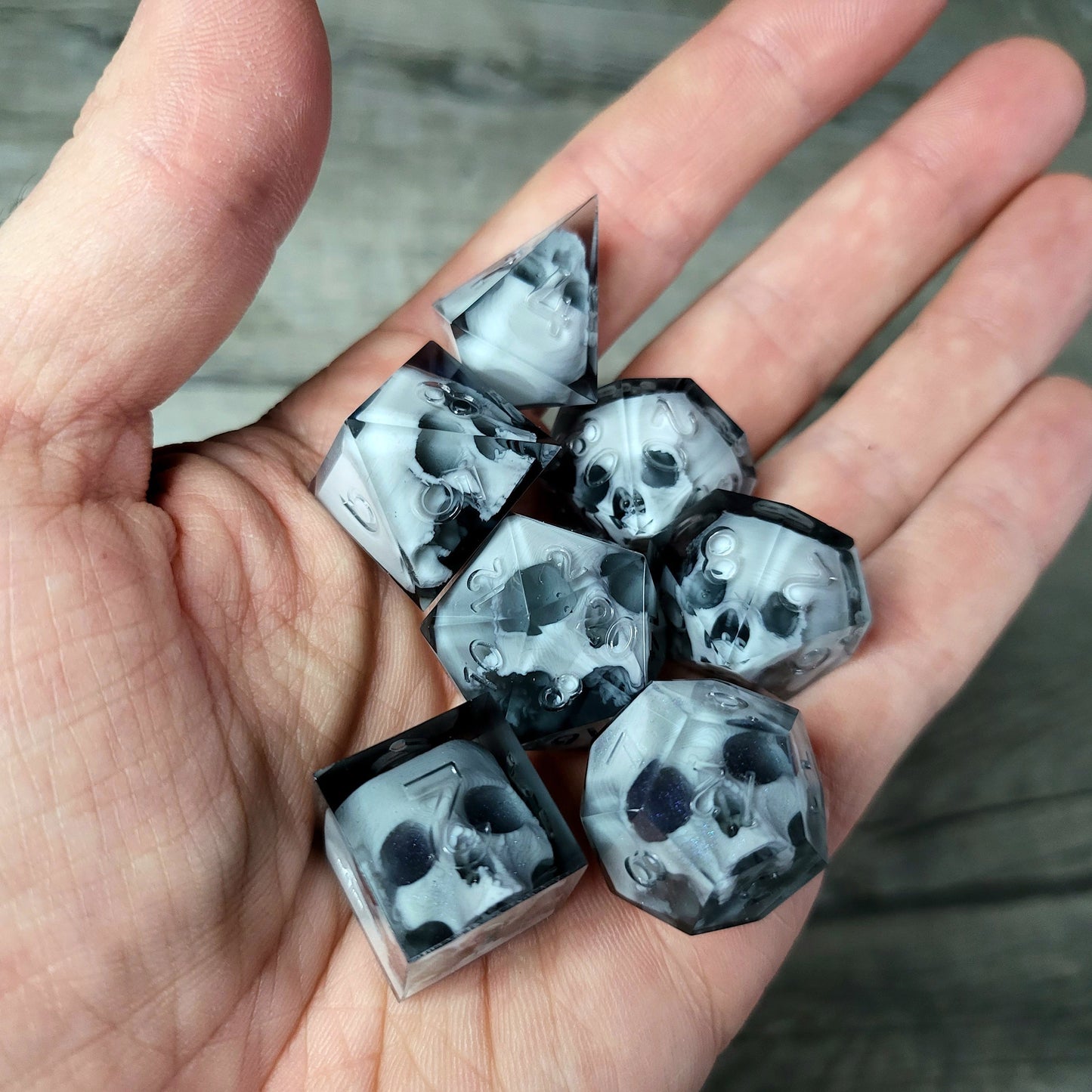 Dice set with 7 pieces with skull inside for role-playing games for Dungeons and Dragons