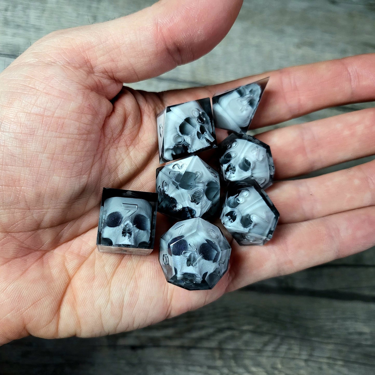 Dice set with 7 pieces with skull inside for role-playing games for Dungeons and Dragons