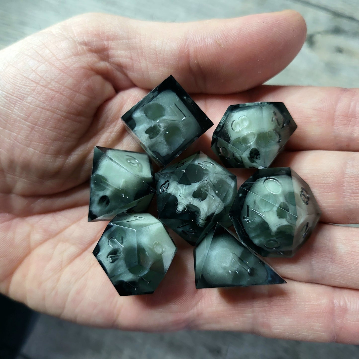 Dice set with 7 pieces with skull inside for role-playing games for Dungeons and Dragons