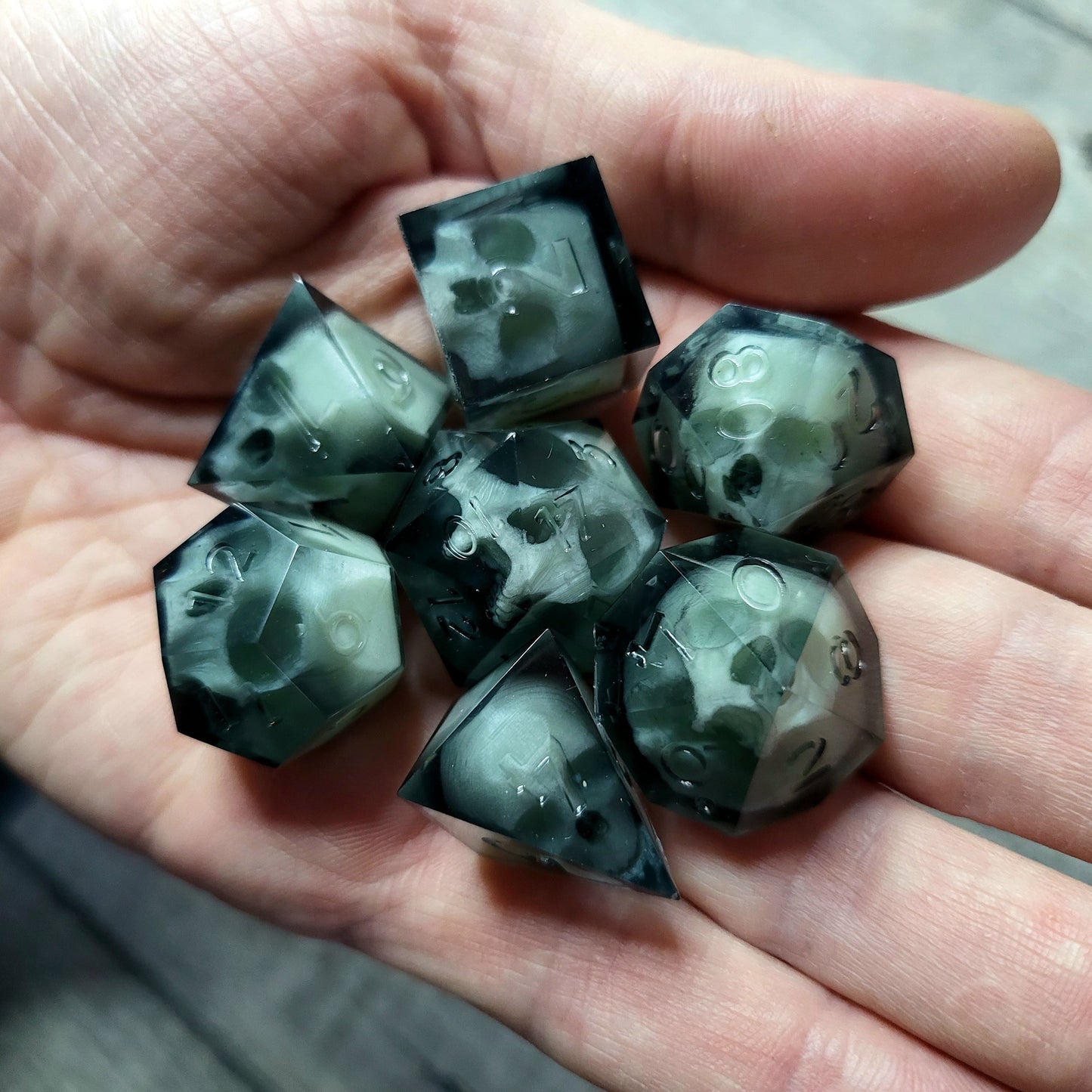 Dice set with 7 pieces with skull inside for role-playing games for Dungeons and Dragons