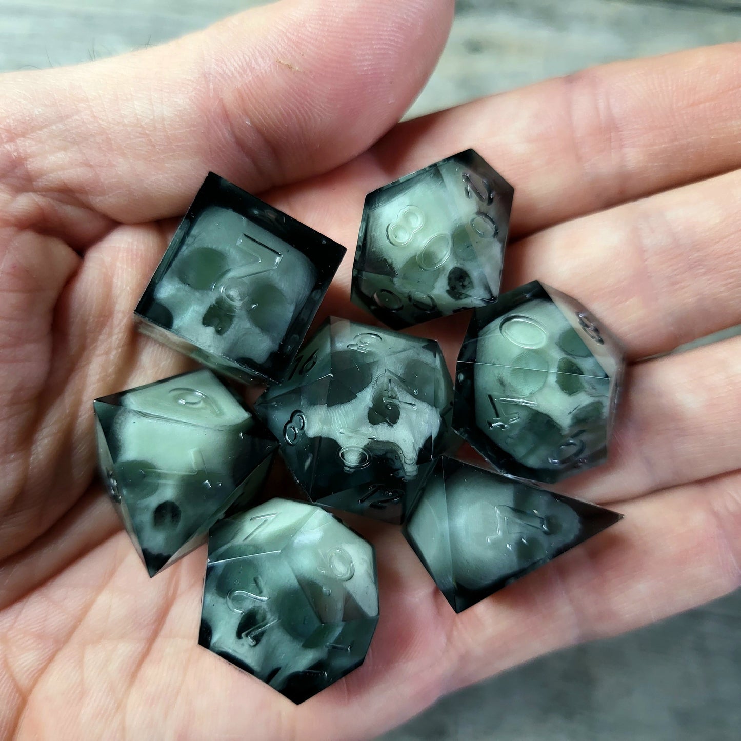 Dice set with 7 pieces with skull inside for role-playing games for Dungeons and Dragons