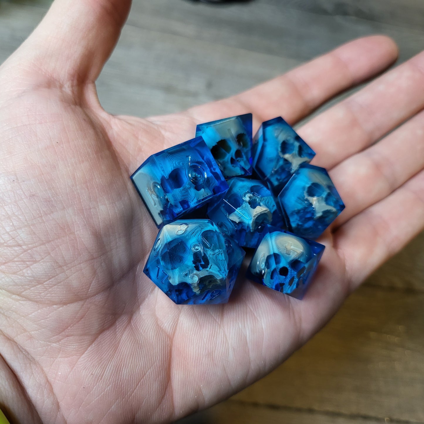 Dice set with 7 pieces with skull inside for role-playing games for Dungeons and Dragons