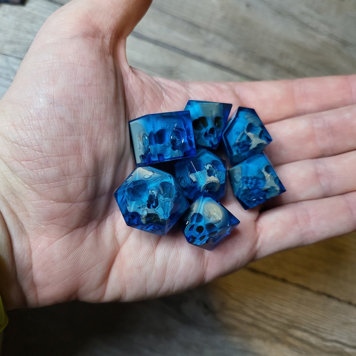 Dice set with 7 pieces with skull inside for role-playing games for Dungeons and Dragons