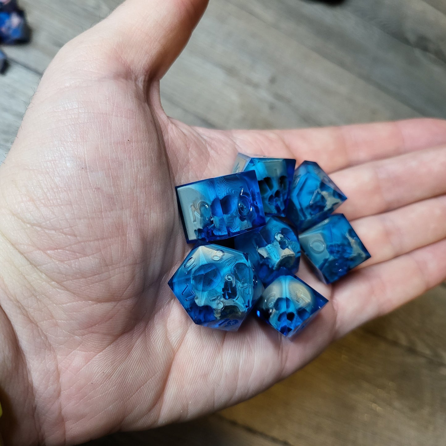Dice set with 7 pieces with skull inside for role-playing games for Dungeons and Dragons