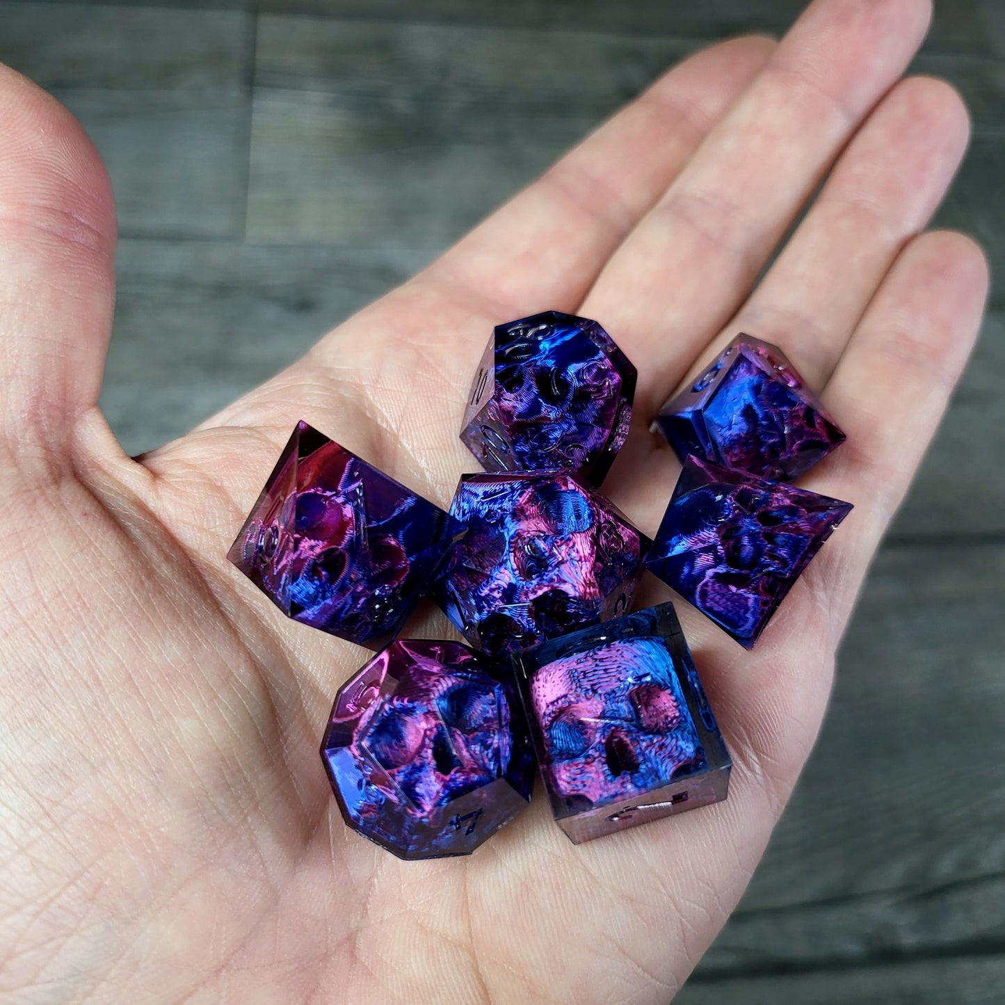 Dice set with 7 pieces with skull inside for role-playing games for Dungeons and Dragons