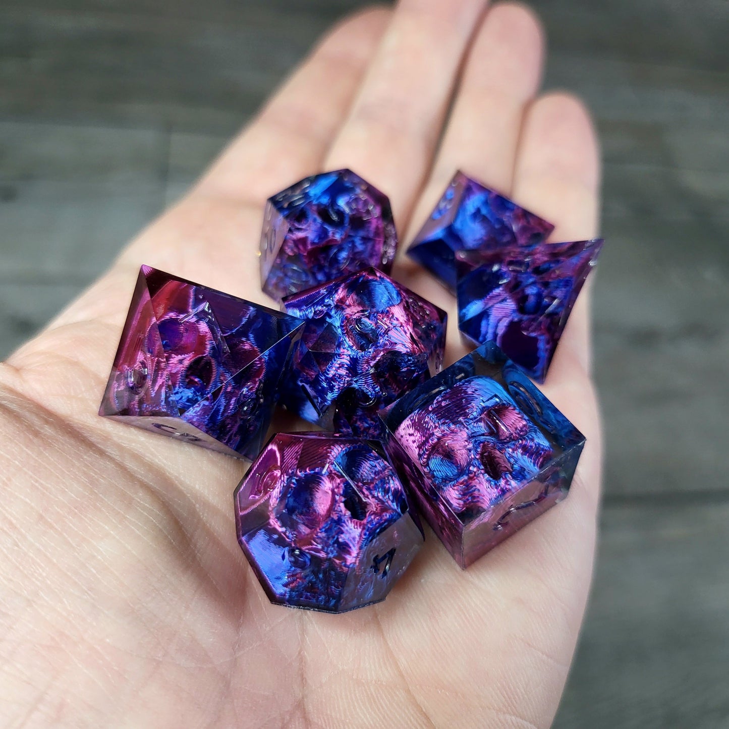 Dice set with 7 pieces with skull inside for role-playing games for Dungeons and Dragons