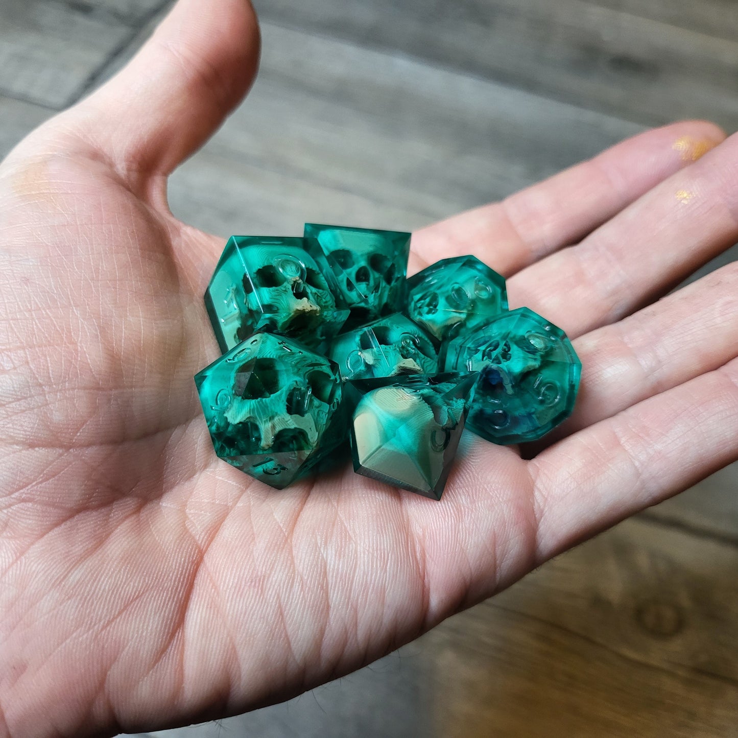 Dice set with 7 pieces with skull inside for role-playing games for Dungeons and Dragons