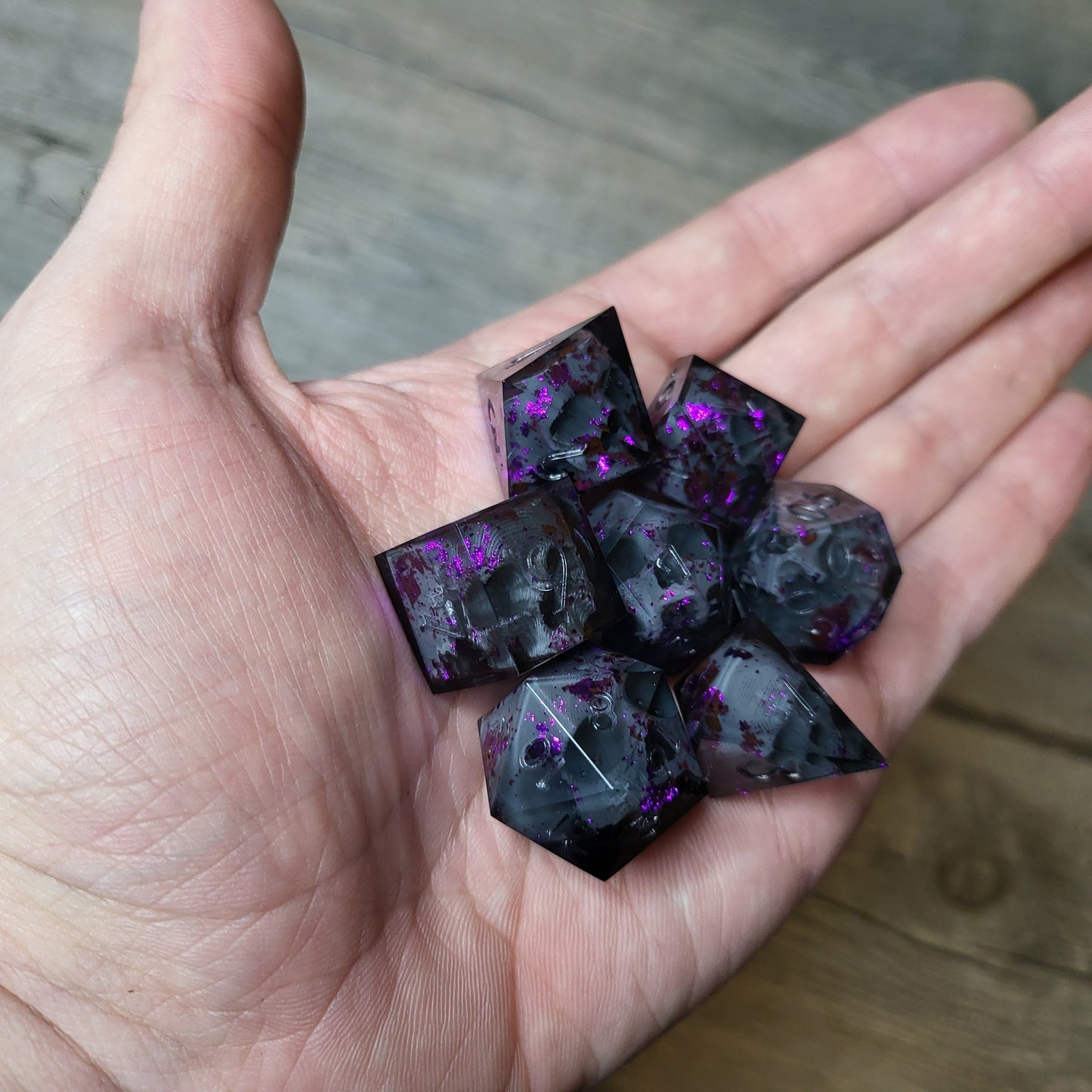 Dice set with 7 pieces with skull inside for role-playing games for Dungeons and Dragons