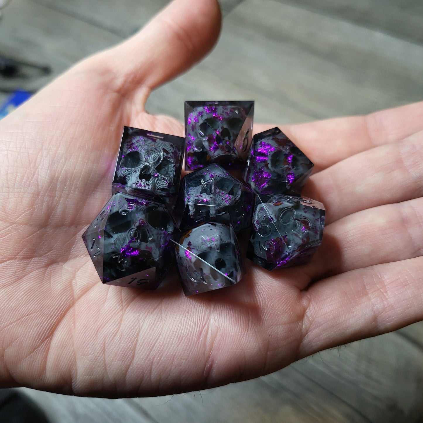 Dice set with 7 pieces with skull inside for role-playing games for Dungeons and Dragons