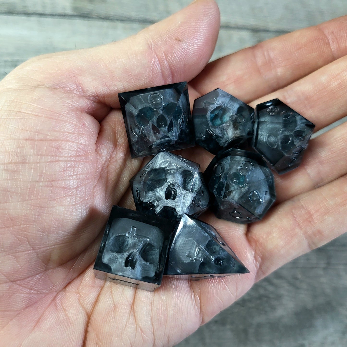 Dice set with 7 pieces with skull inside for role-playing games for Dungeons and Dragons