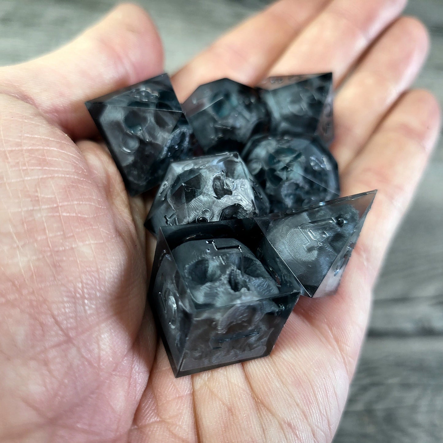 Dice set with 7 pieces with skull inside for role-playing games for Dungeons and Dragons