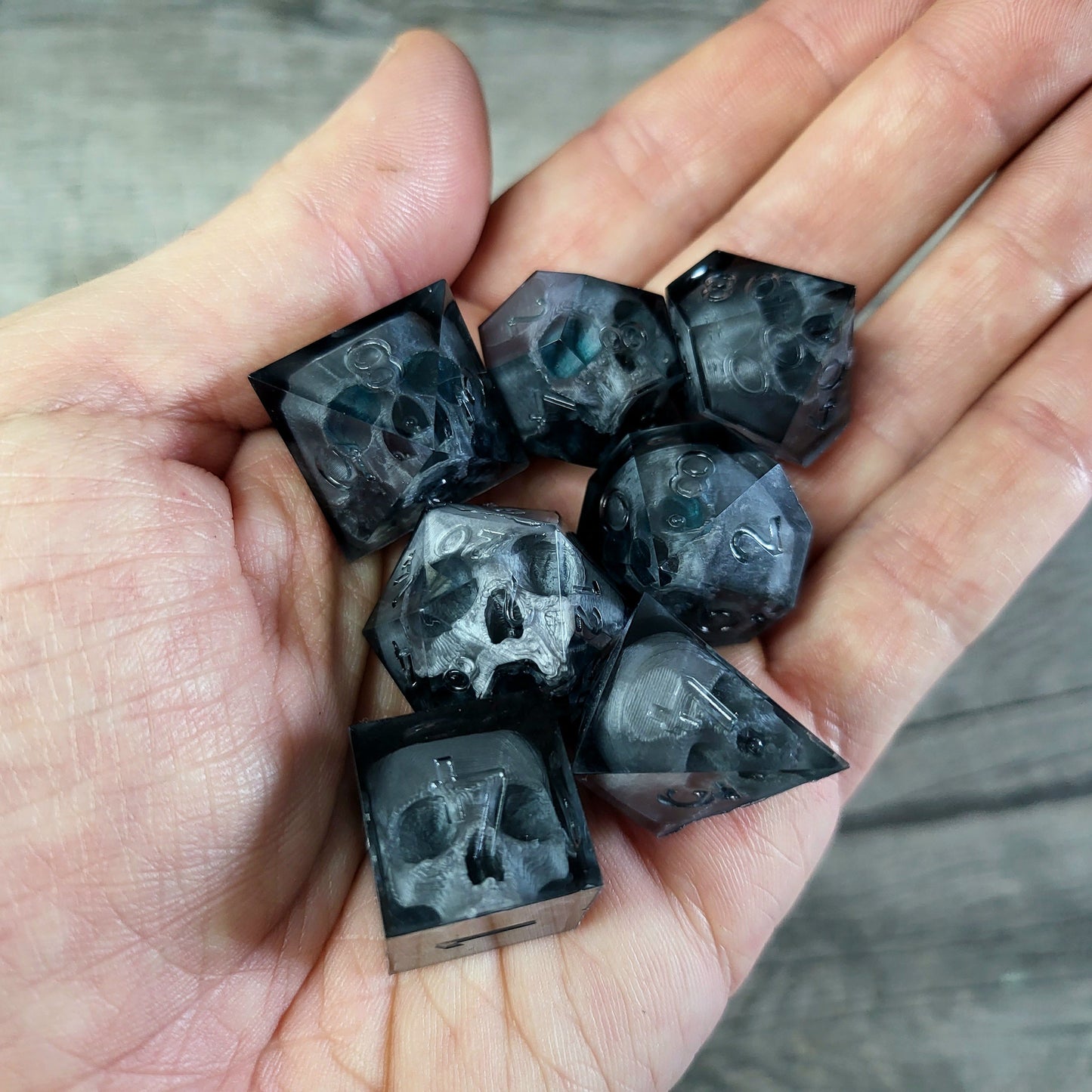 Dice set with 7 pieces with skull inside for role-playing games for Dungeons and Dragons
