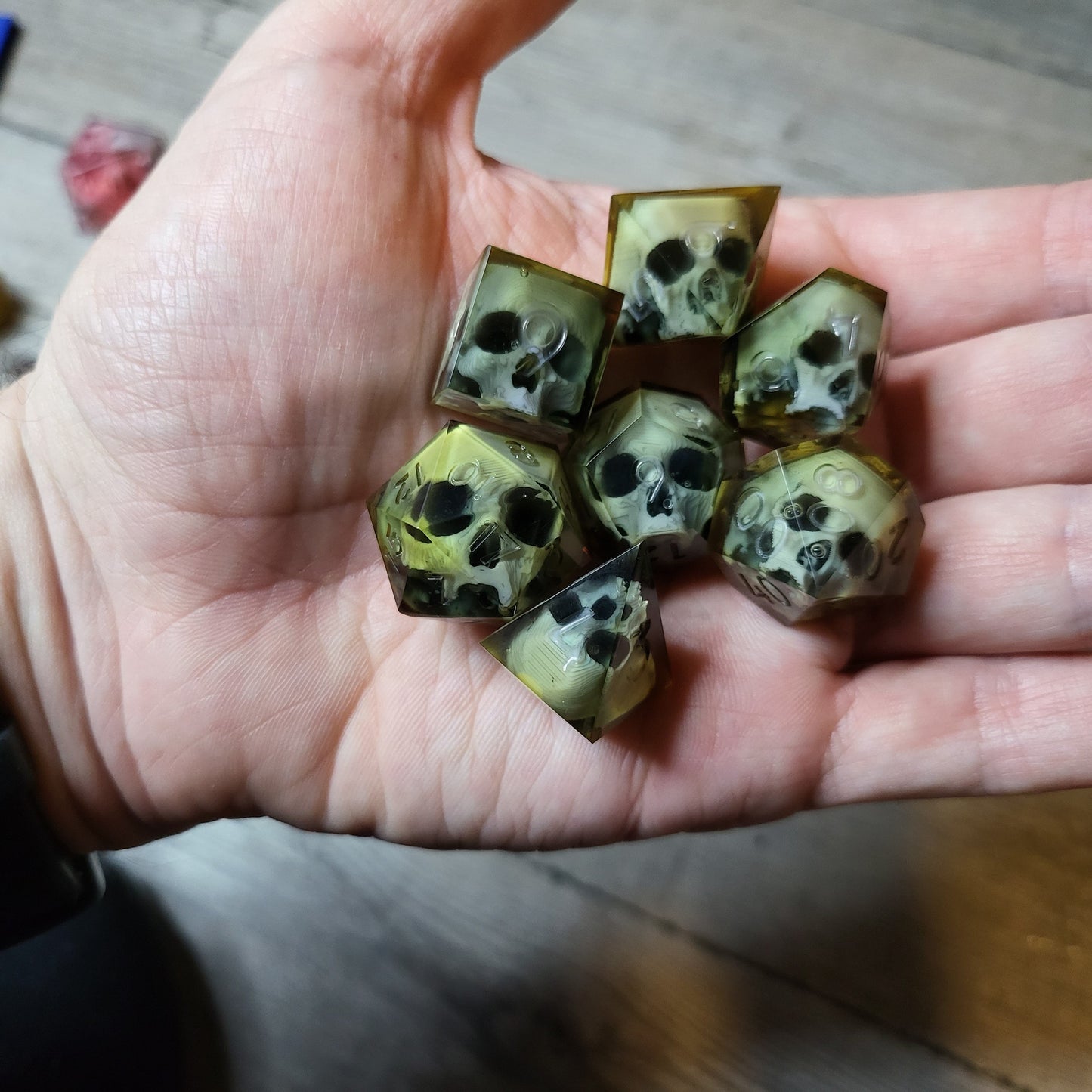 Dice set with 7 pieces with skull inside for role-playing games for Dungeons and Dragons