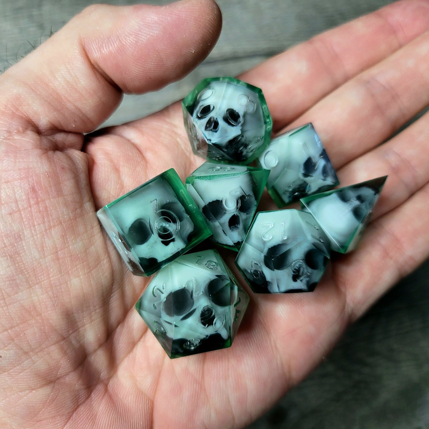 Dice set with 7 pieces with skull inside for role-playing games for Dungeons and Dragons